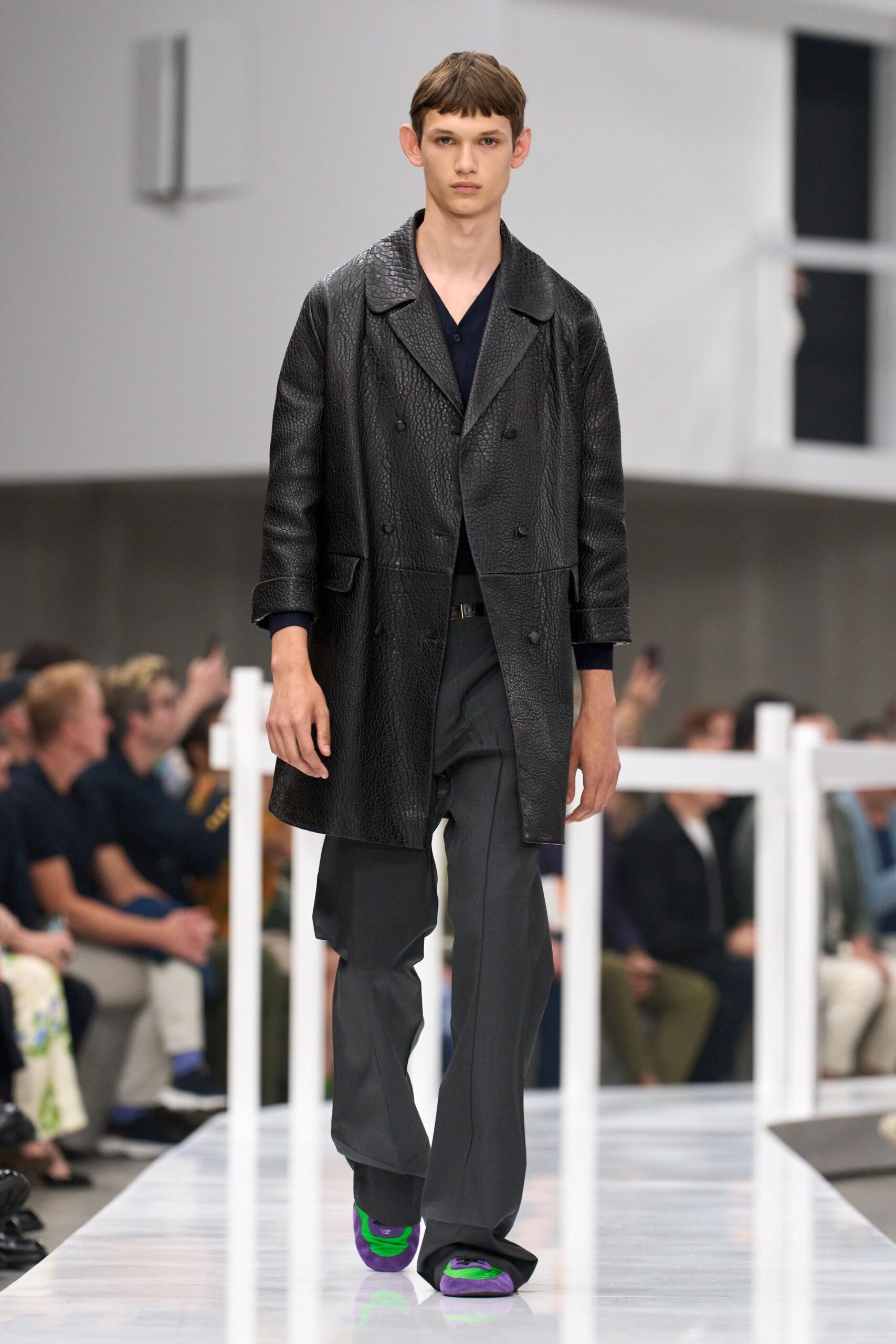 black leather long-sleeve collared relaxed textured coat