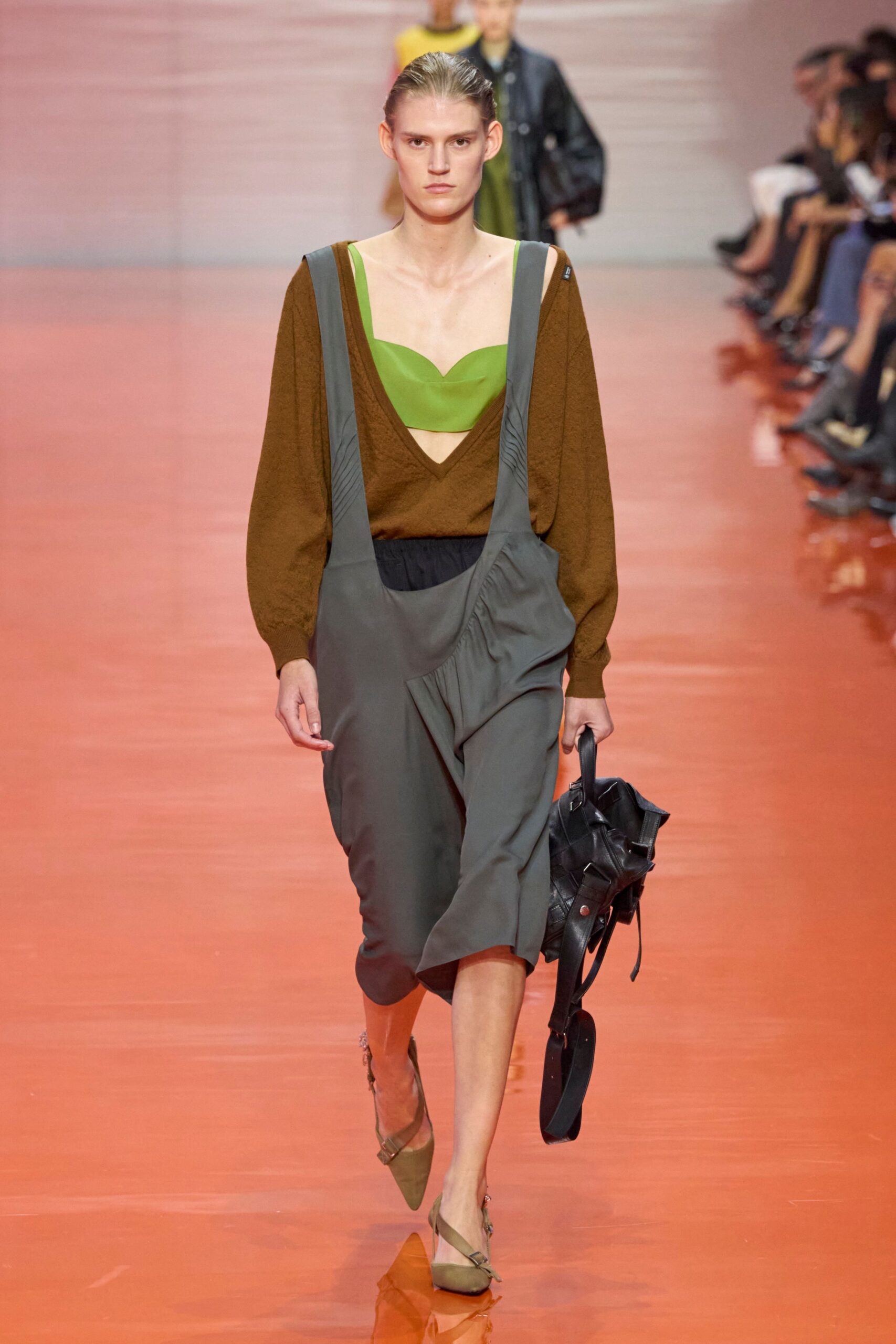 brown relaxed top with gray pants