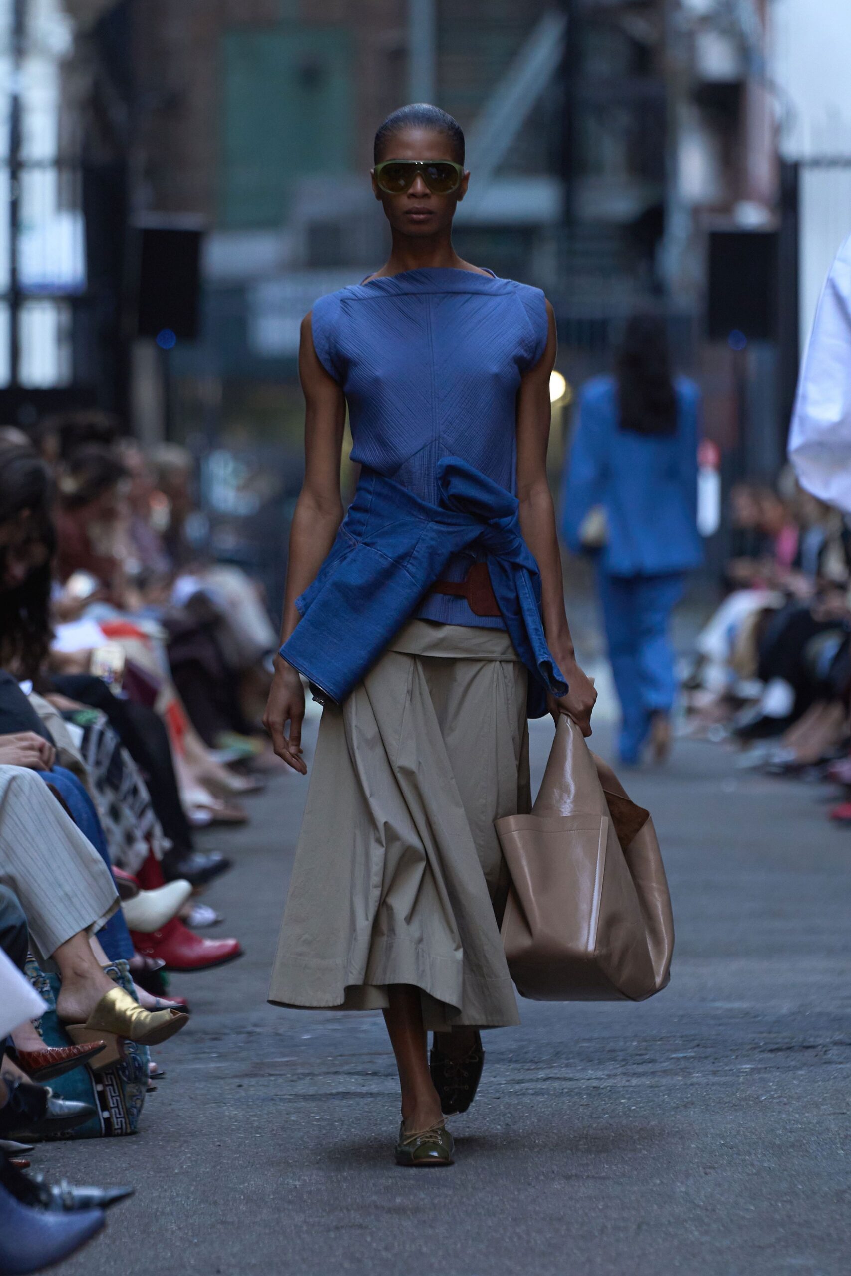 blue fitted top beige pleated skirt