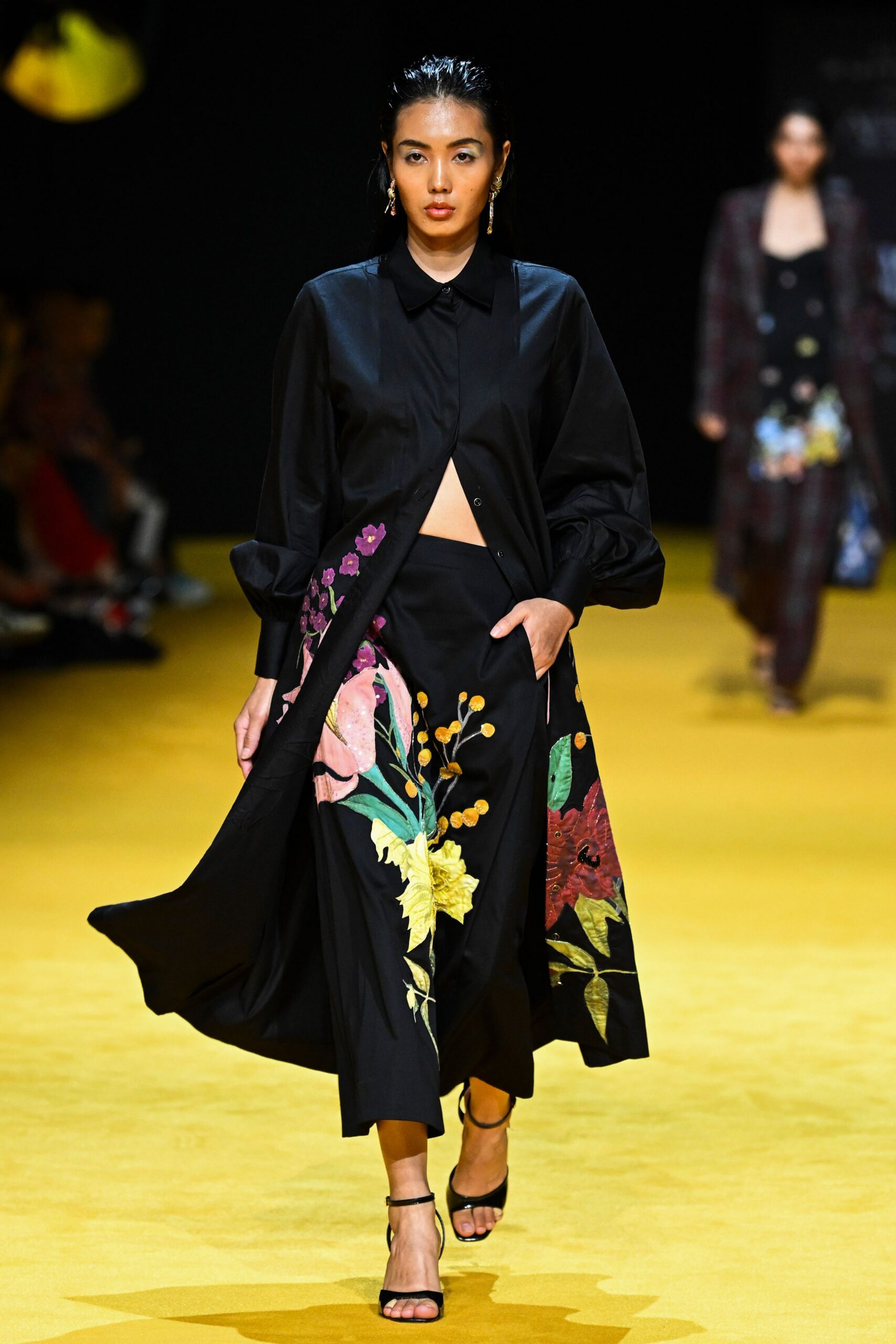 black embroidered shirt-dress and skirt