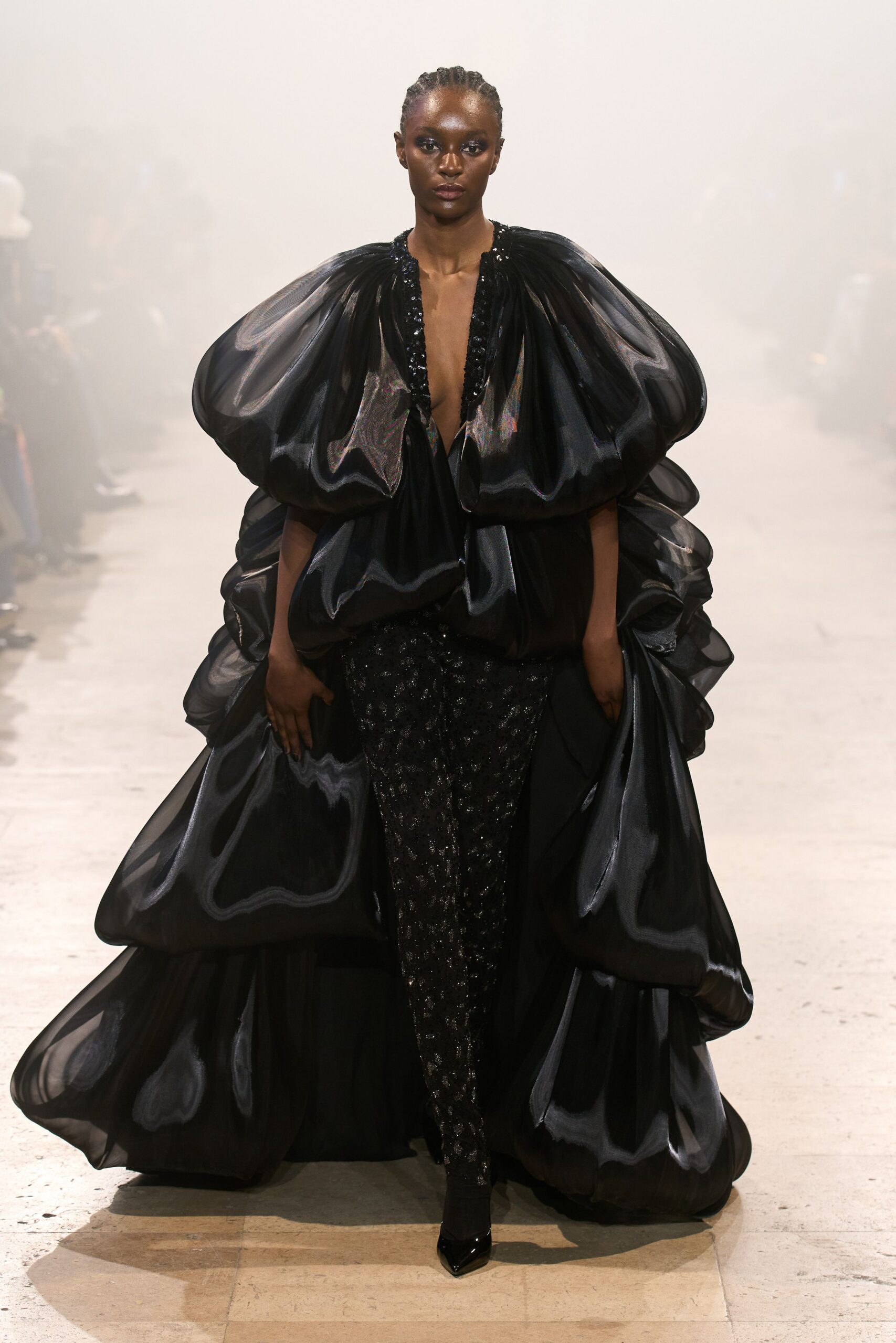 black silk layered gown with fitted pants