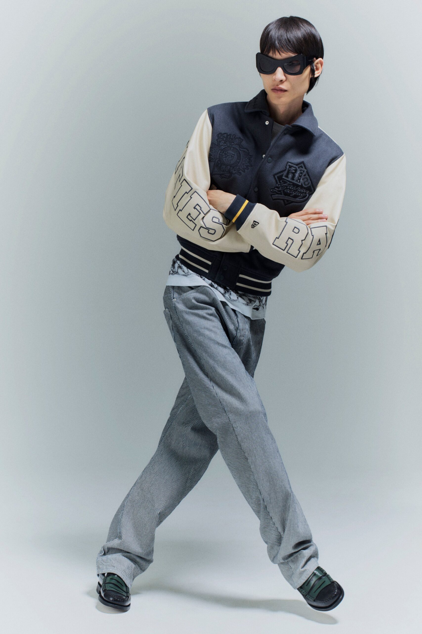 black beige relaxed jacket with gray pants