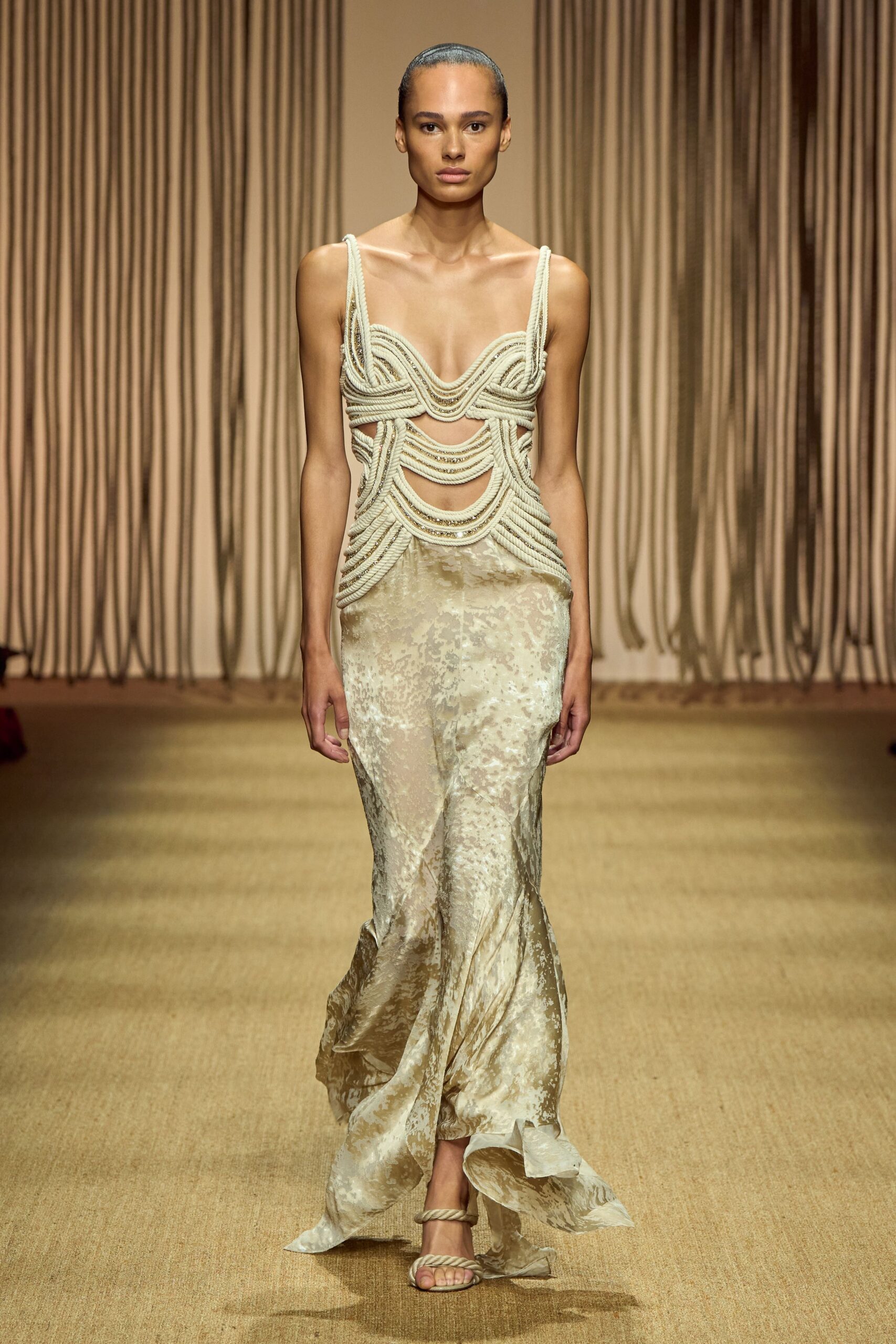 gold silk sleeveless v-neck fitted draped flowing gown