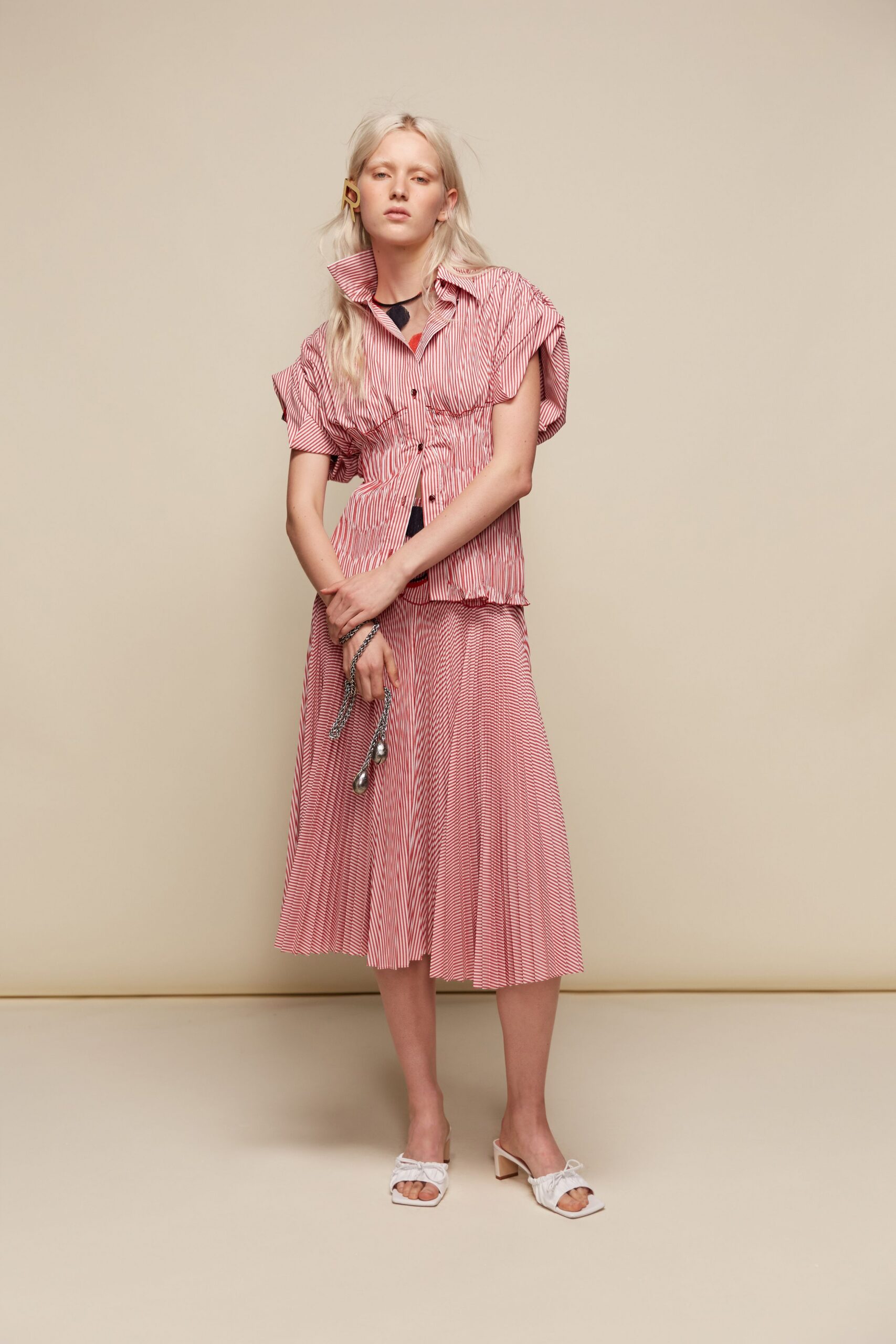 pink cotton short-sleeve collared fitted striped pleated top