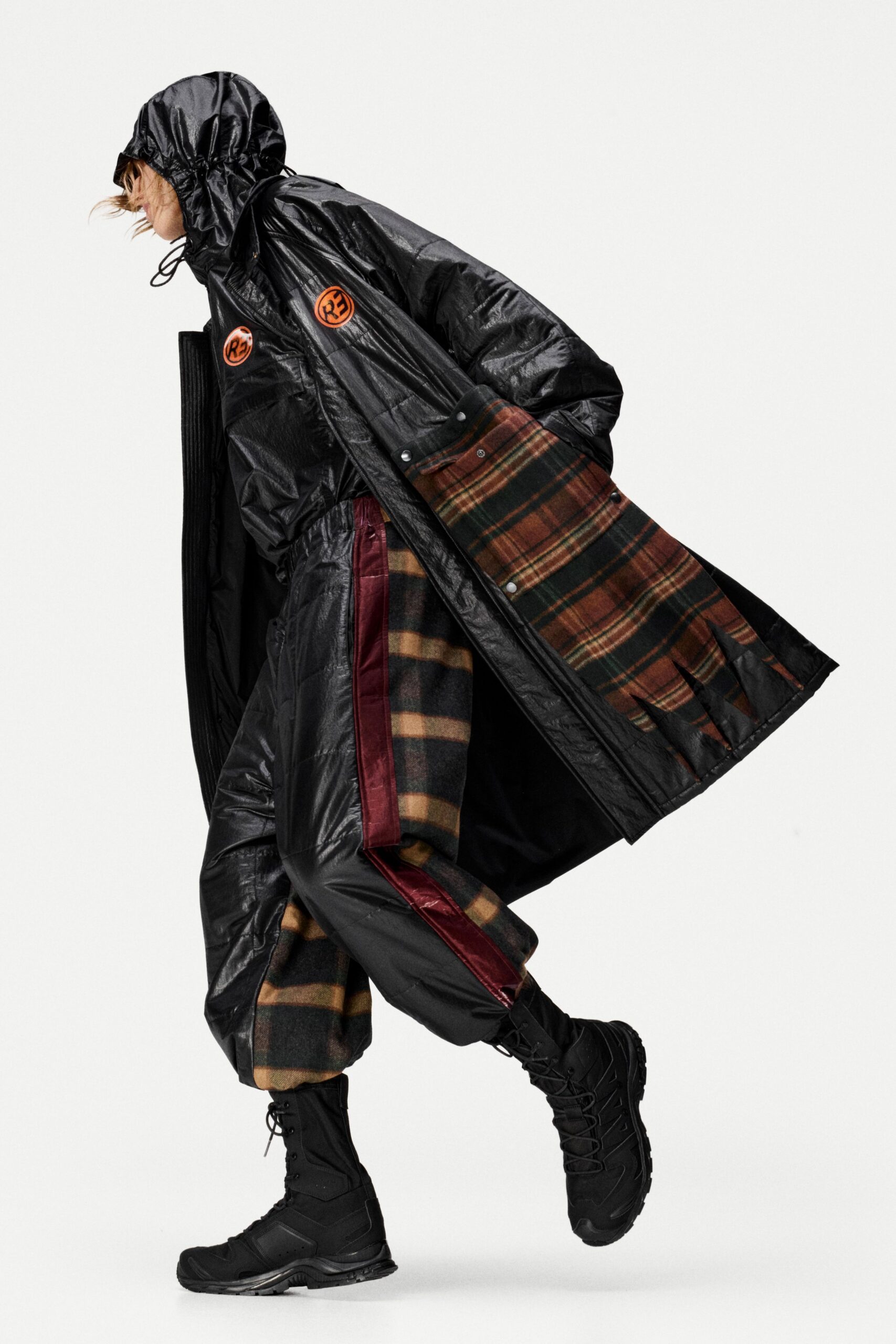 black vinyl long-sleeve hooded relaxed zippered layered coat