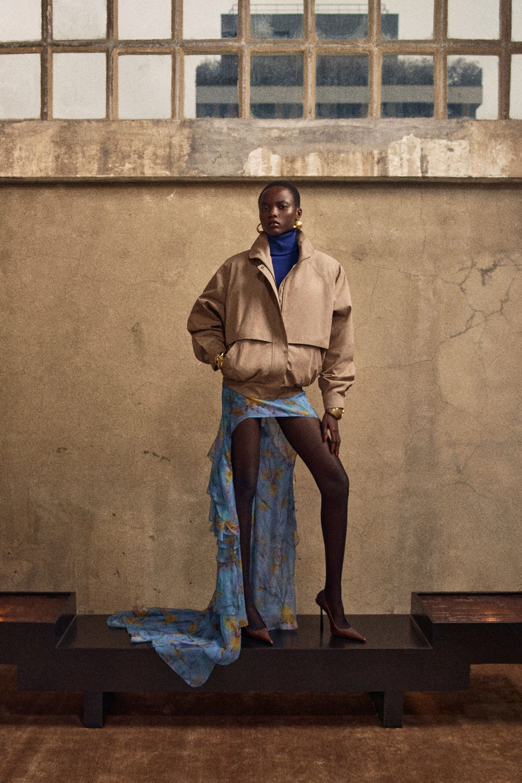 brown oversized jacket with blue skirt