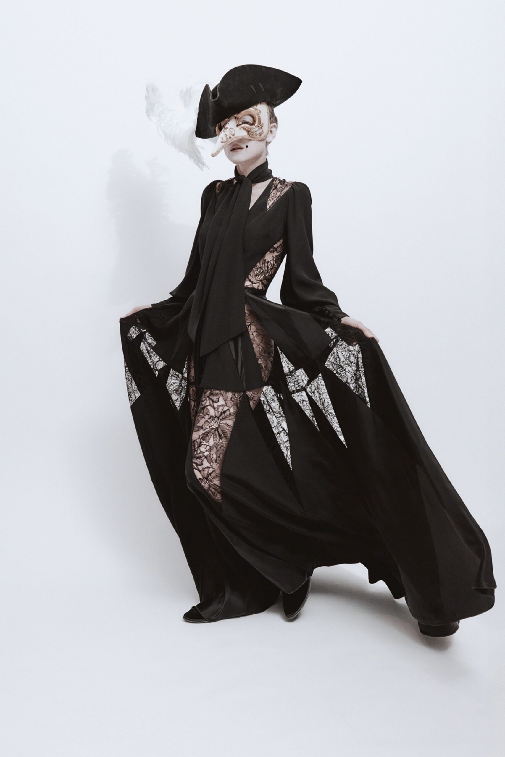 black silk long-sleeve collared fitted layered pleated gown