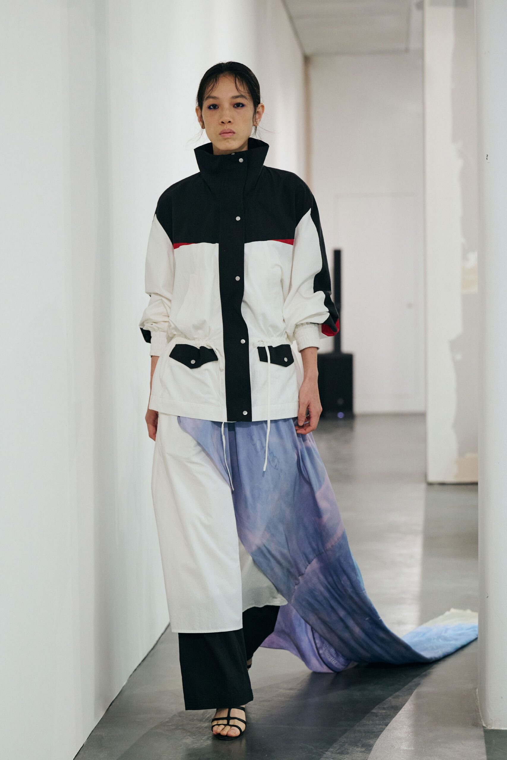 color-blocked jacket with flowing skirt