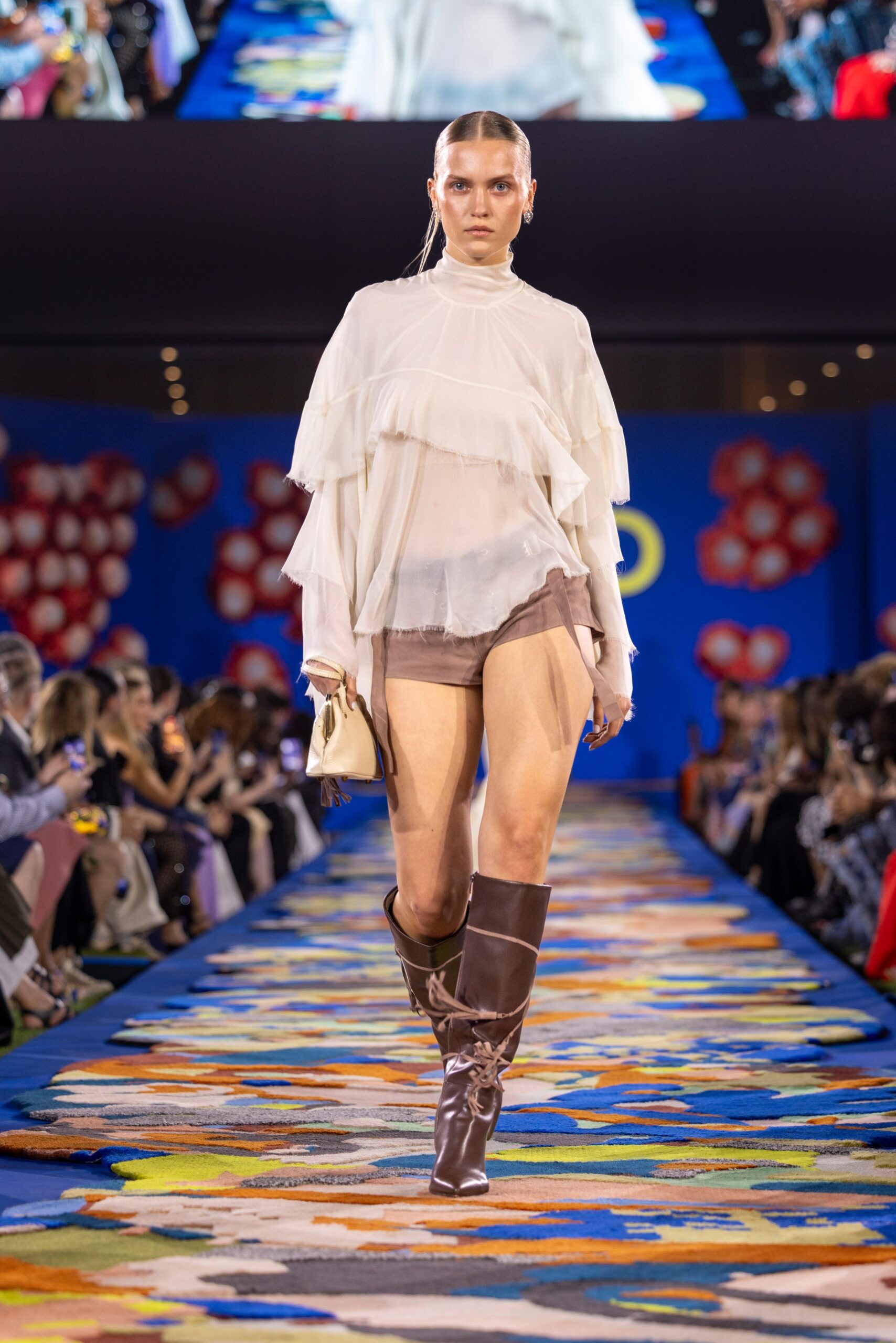 white layered top with brown shorts