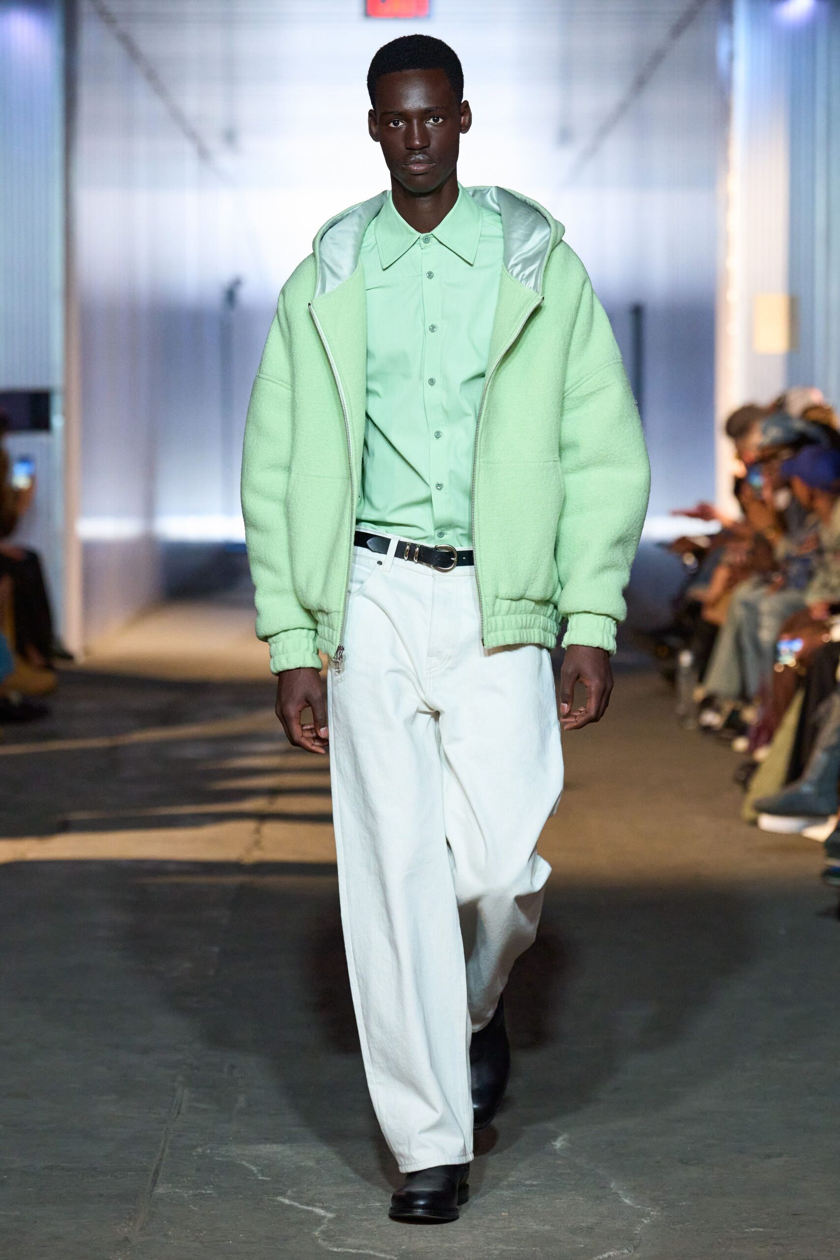 green relaxed jacket with white pants