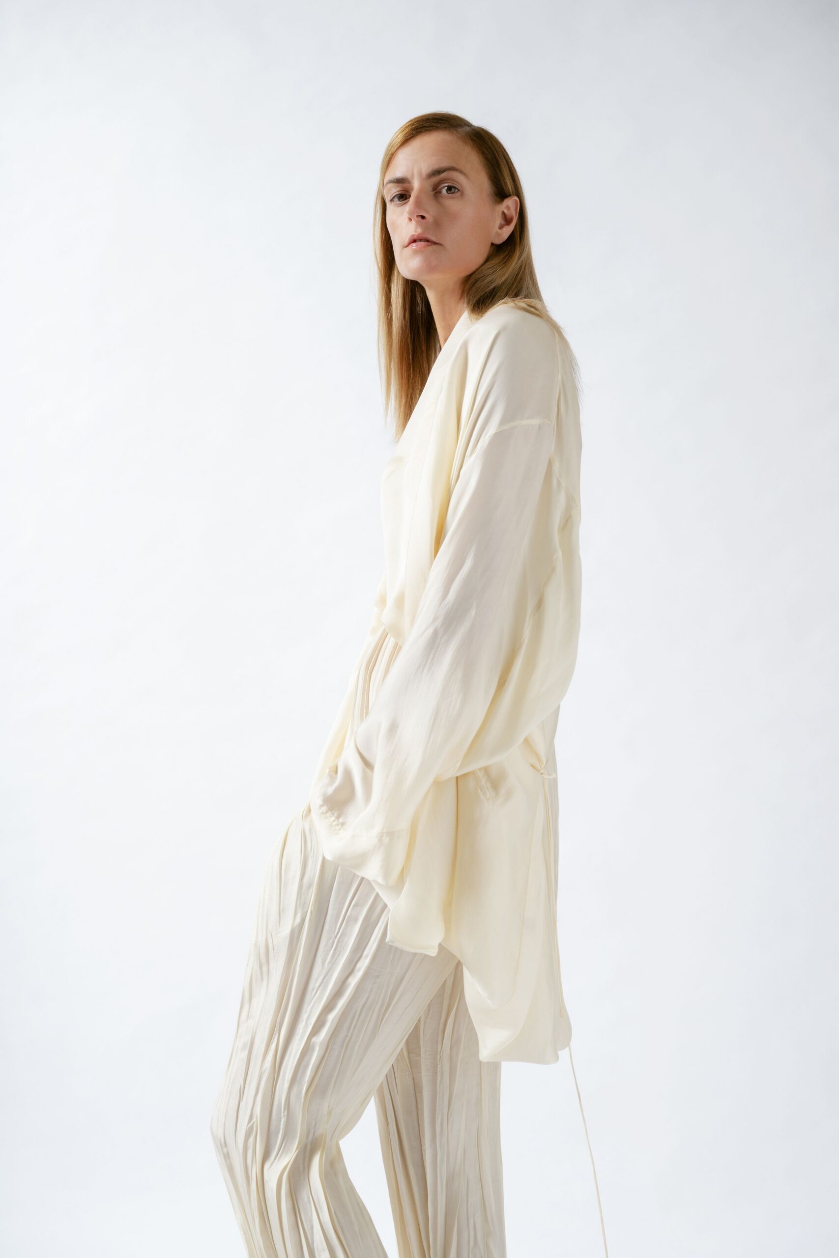 ivory silk long-sleeve relaxed pleated top