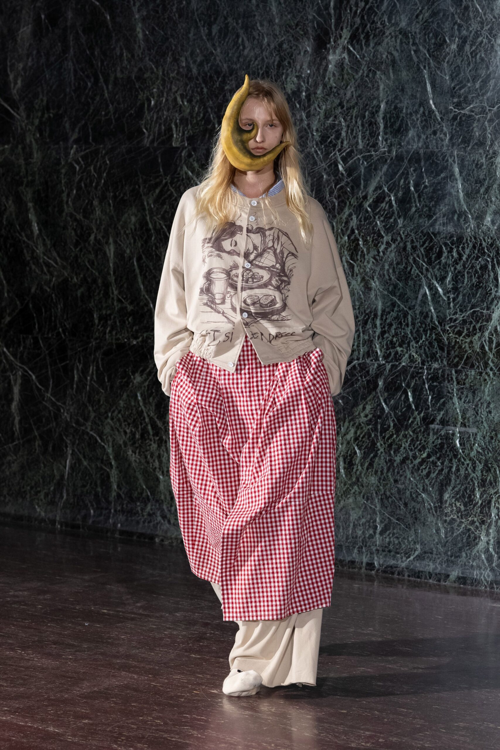 beige shirt red checked pants