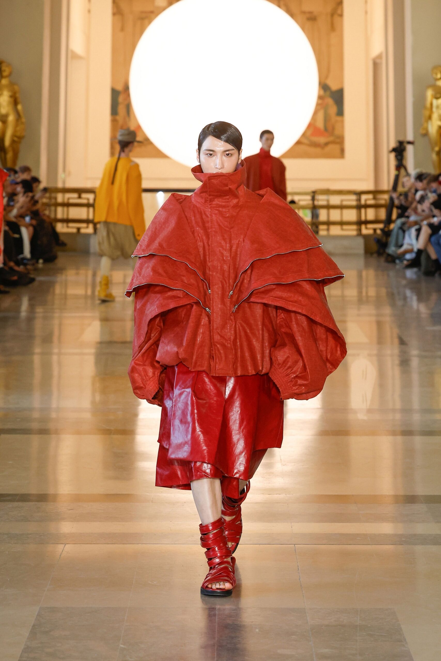 red leather long-sleeve high-neck oversized layered coat