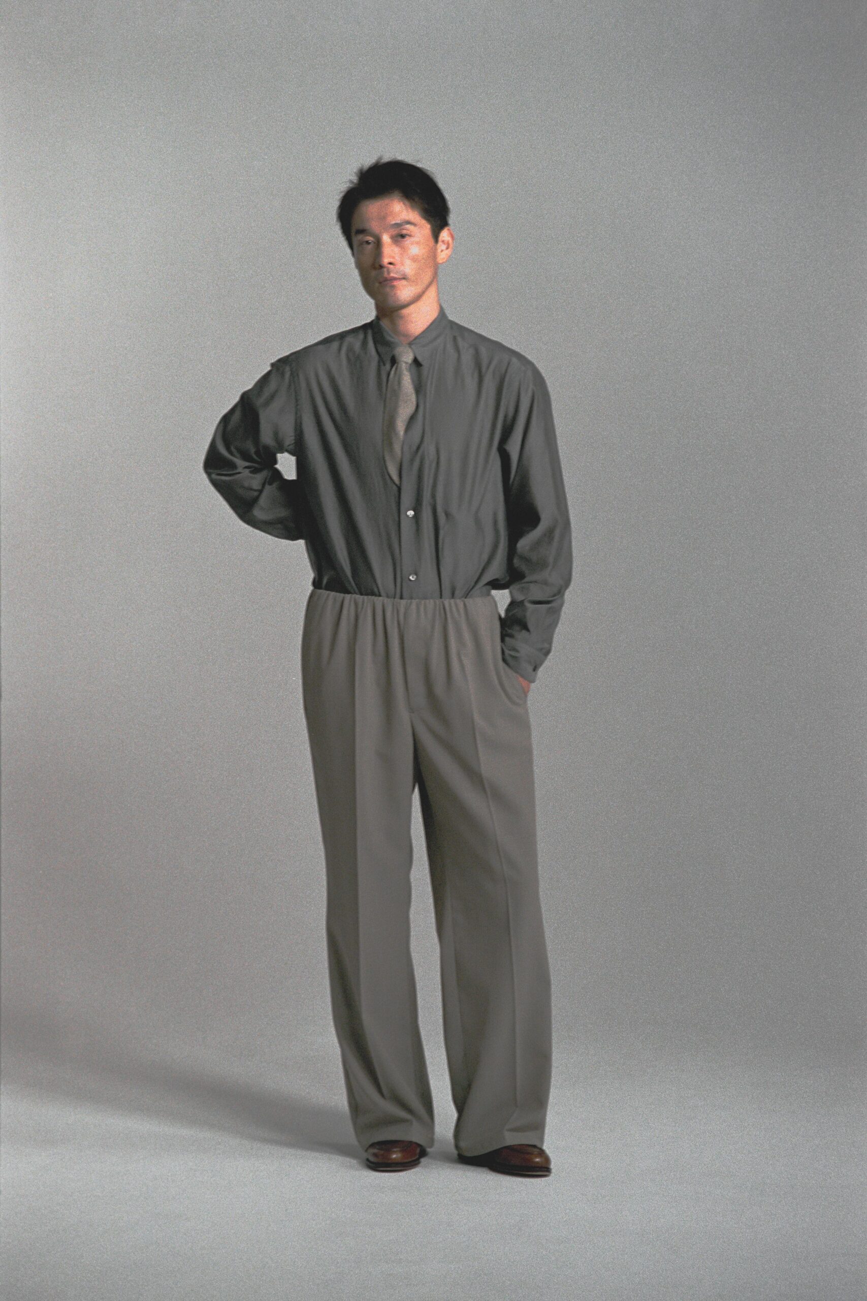 gray shirt beige wide-leg pants