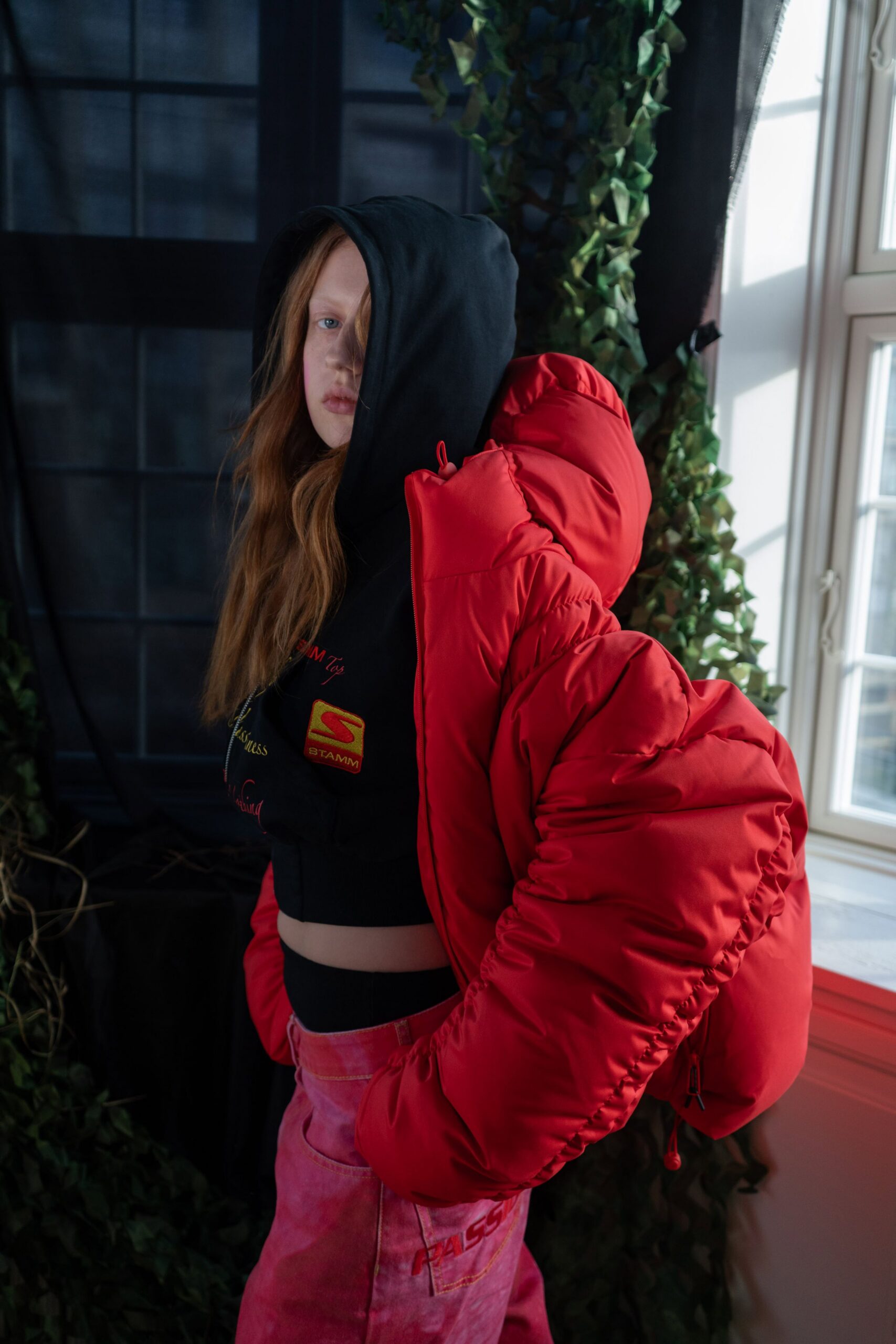 black hoodie red jacket pink pants