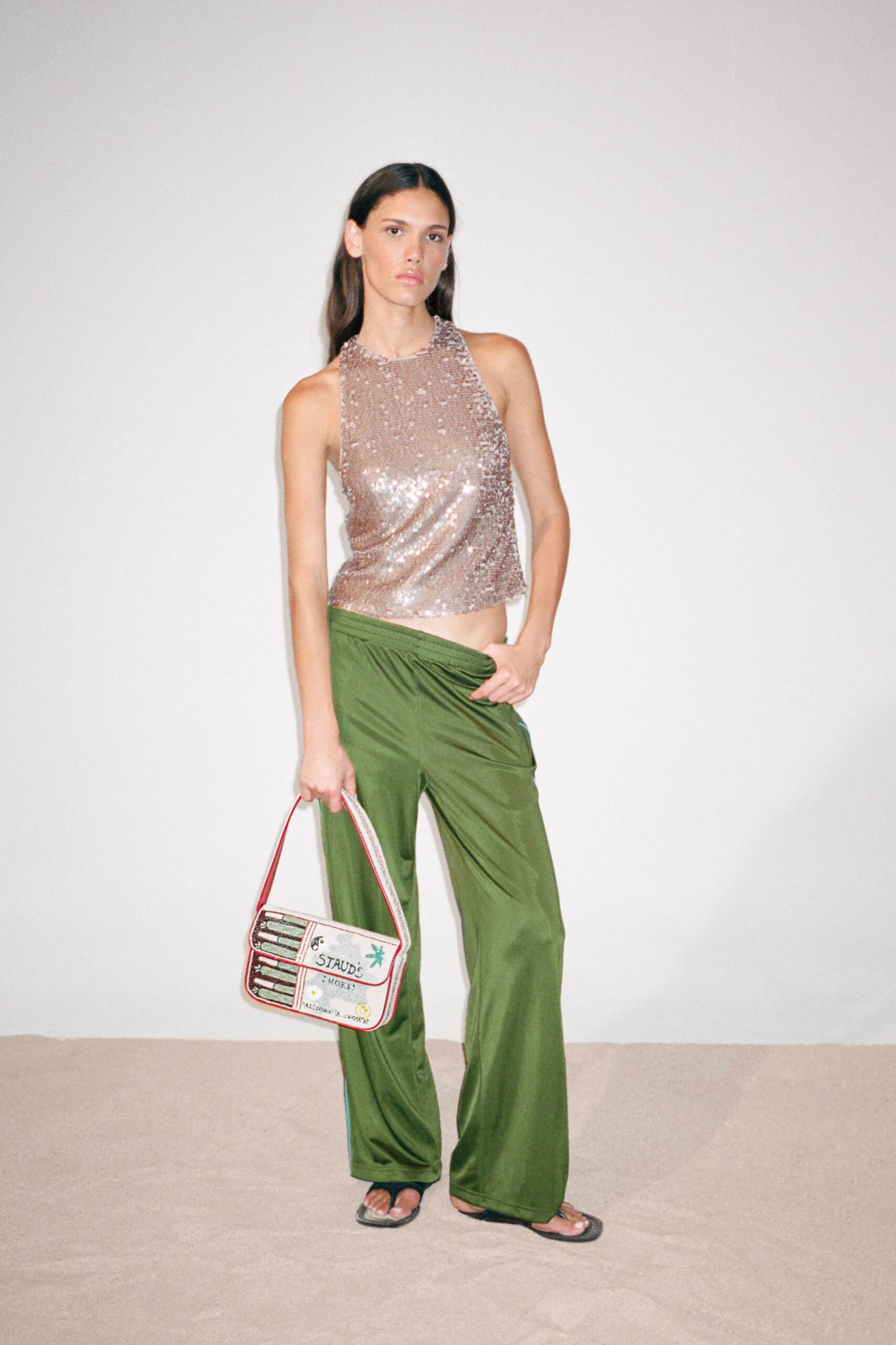 pink sequin sleeveless high-neck fitted shiny top