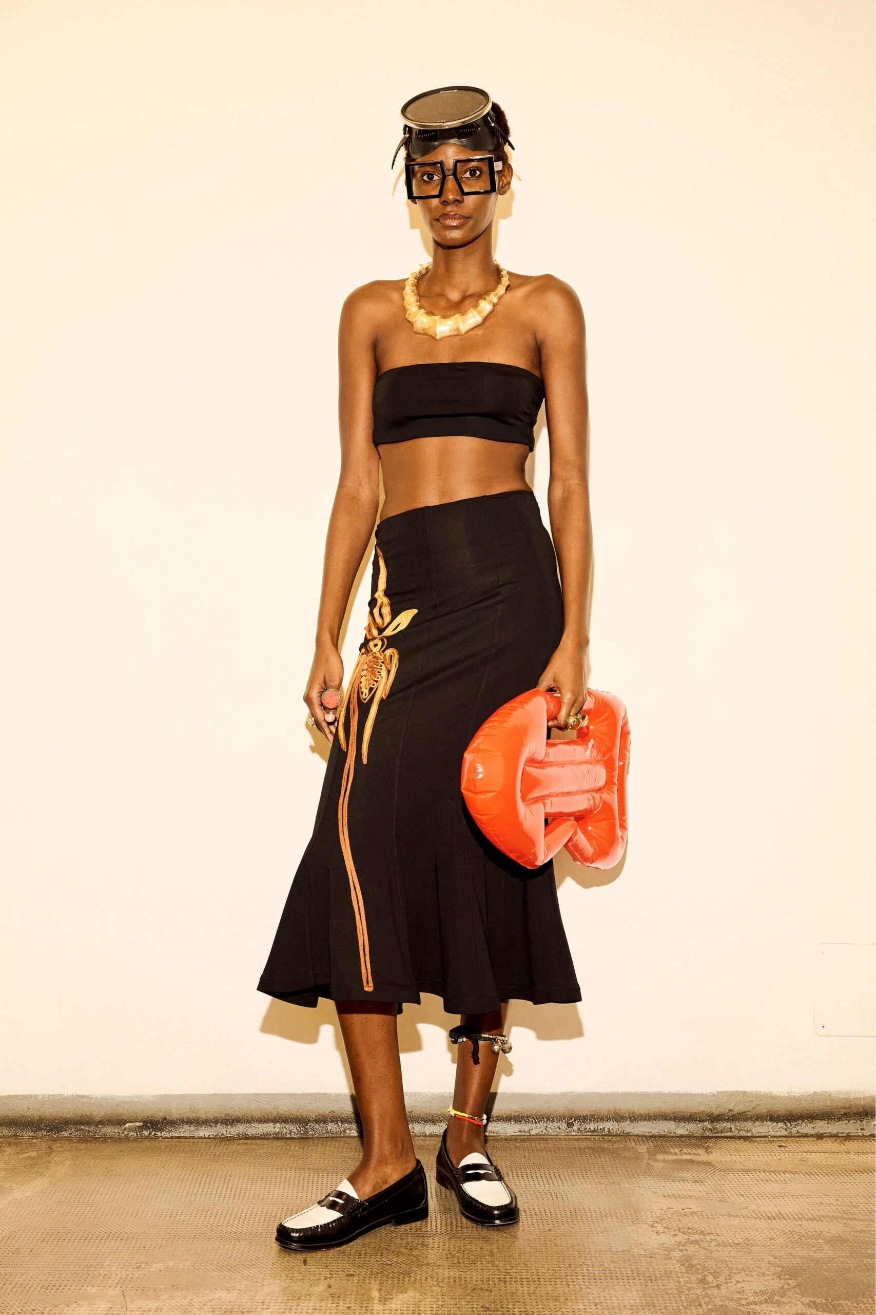 black fitted top and skirt