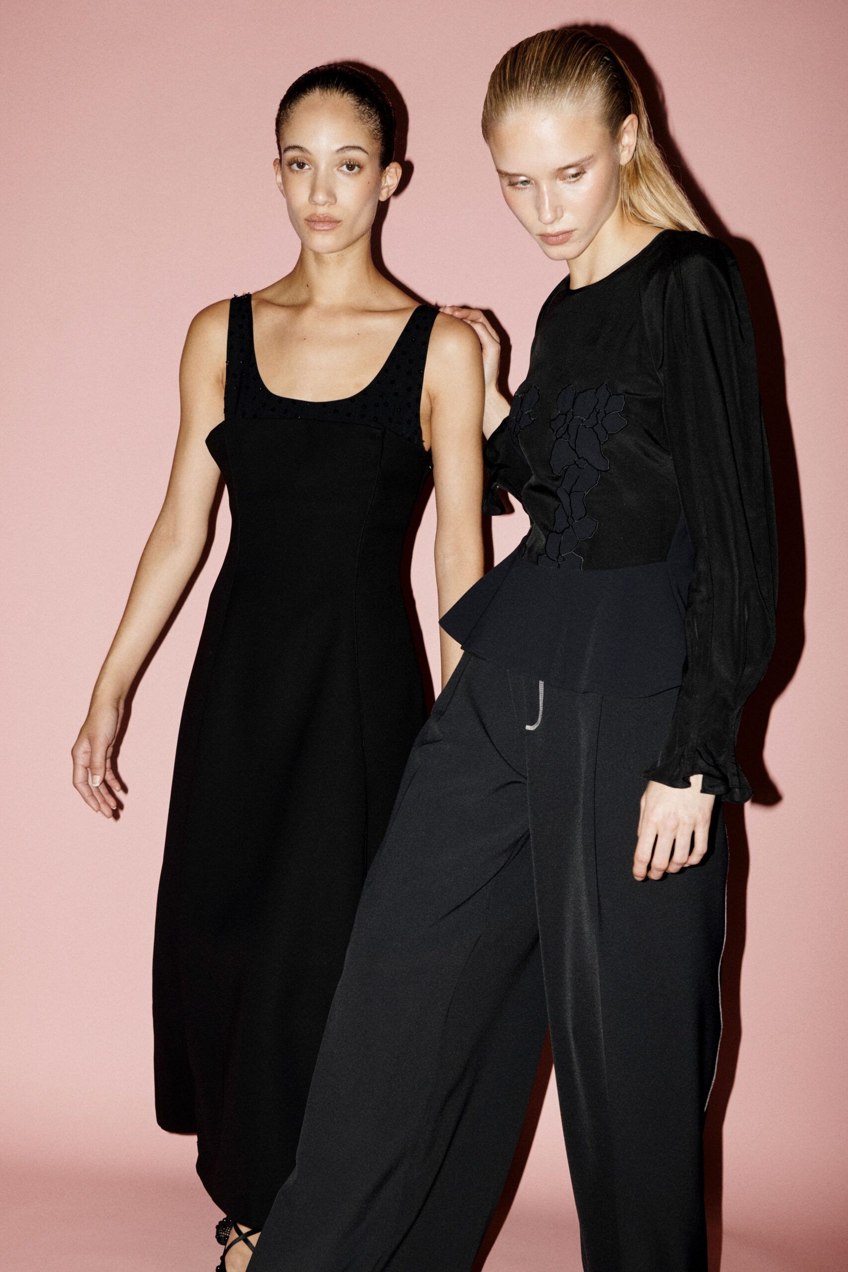 black cotton long-sleeve fitted flared top