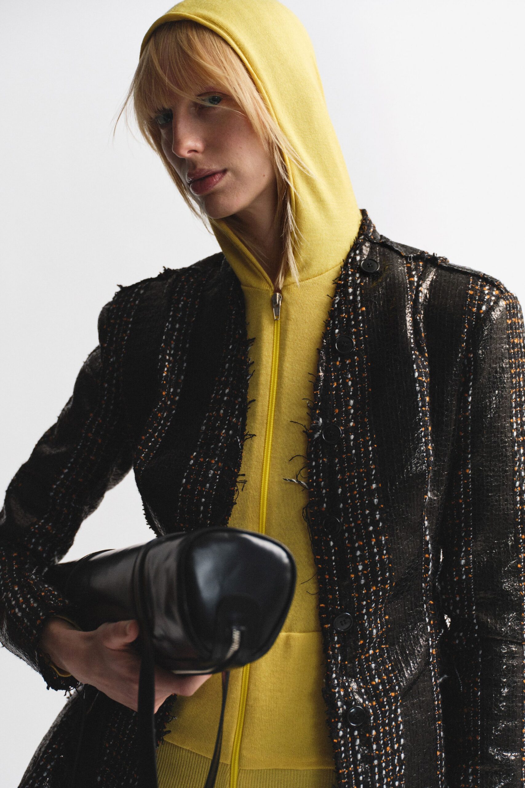 black jacket yellow hoodie
