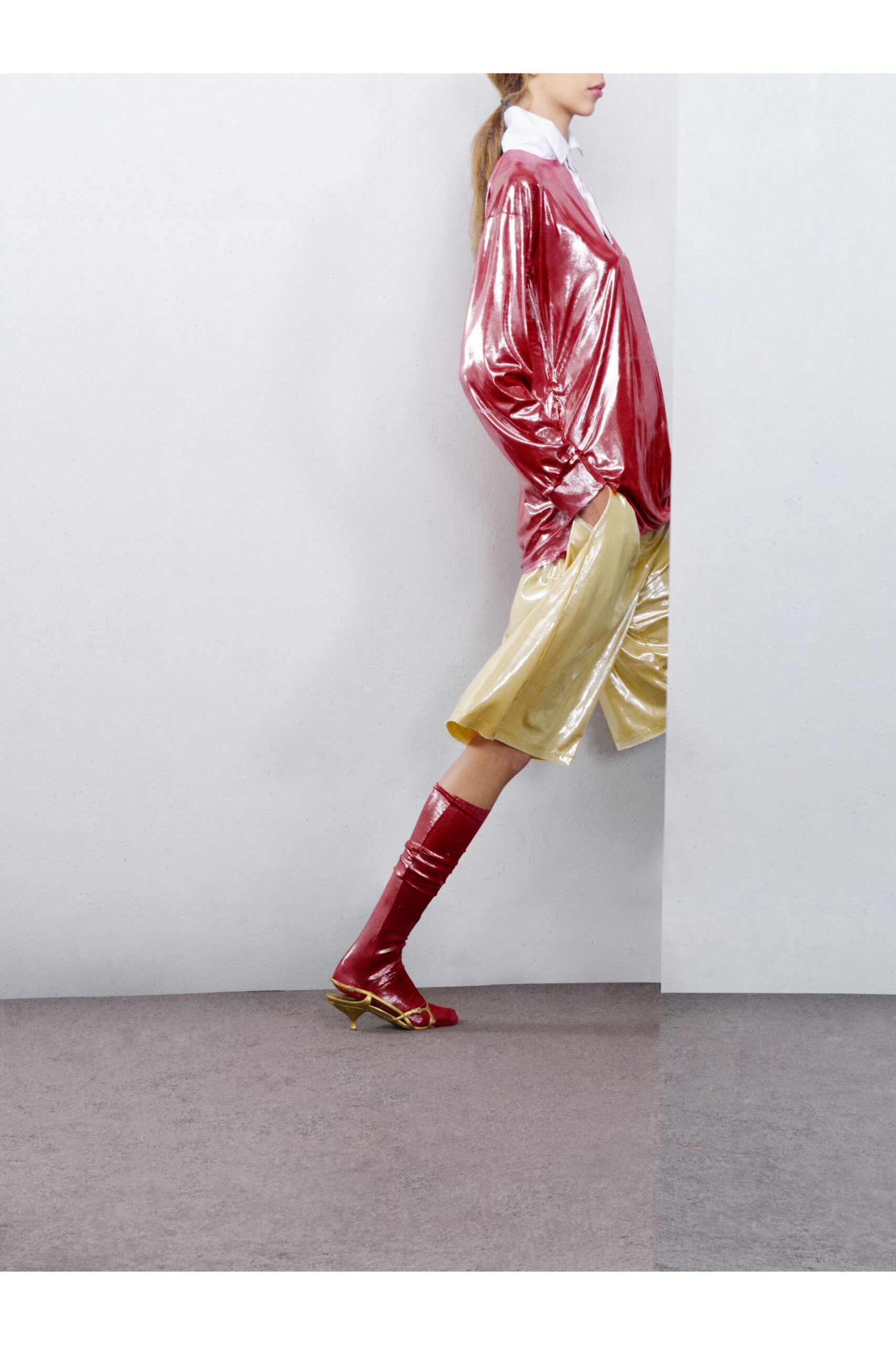 red vinyl top with gold shorts