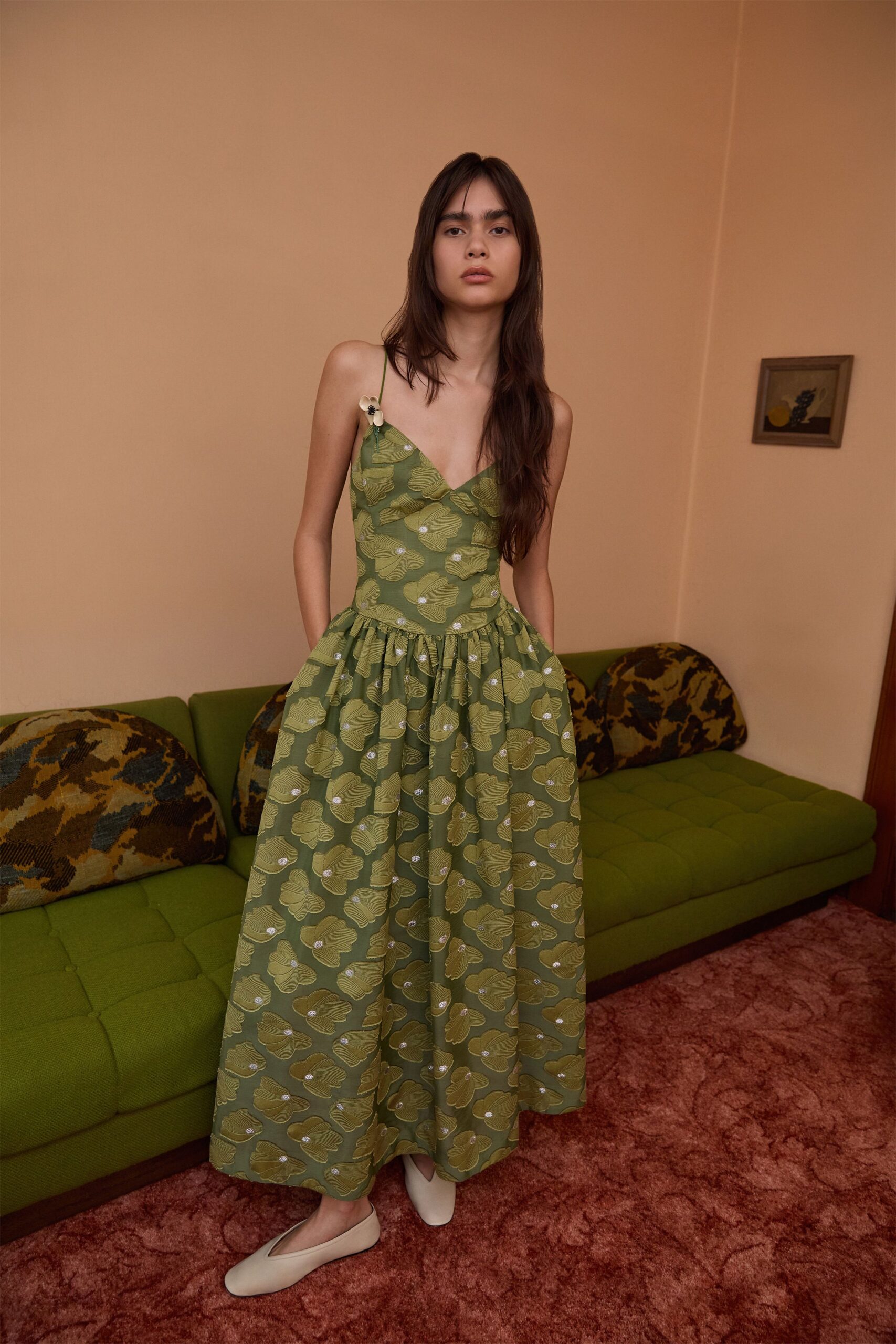 green cotton sleeveless v-neck fitted pleated printed dress