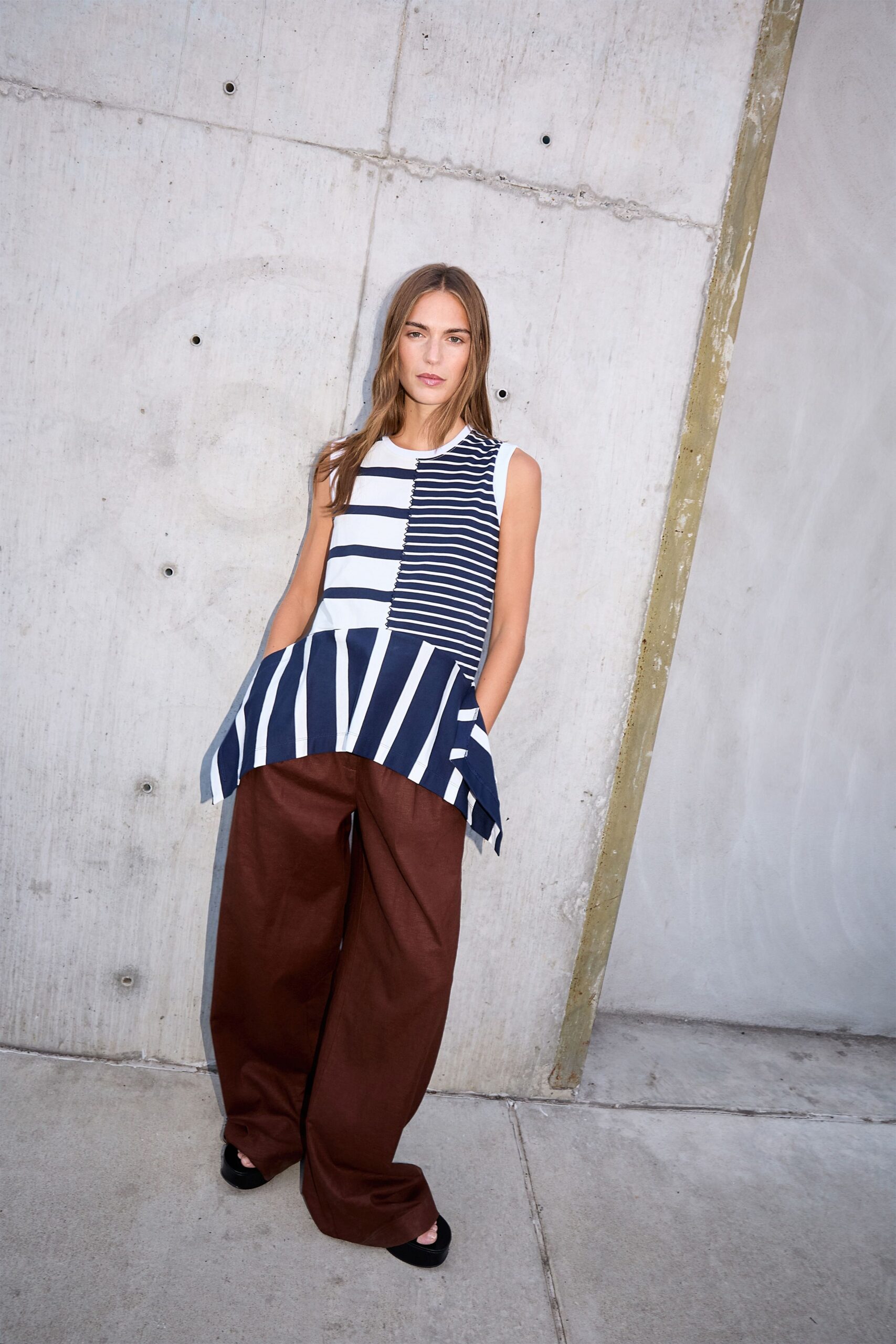 blue and white striped top with brown wide-leg pants