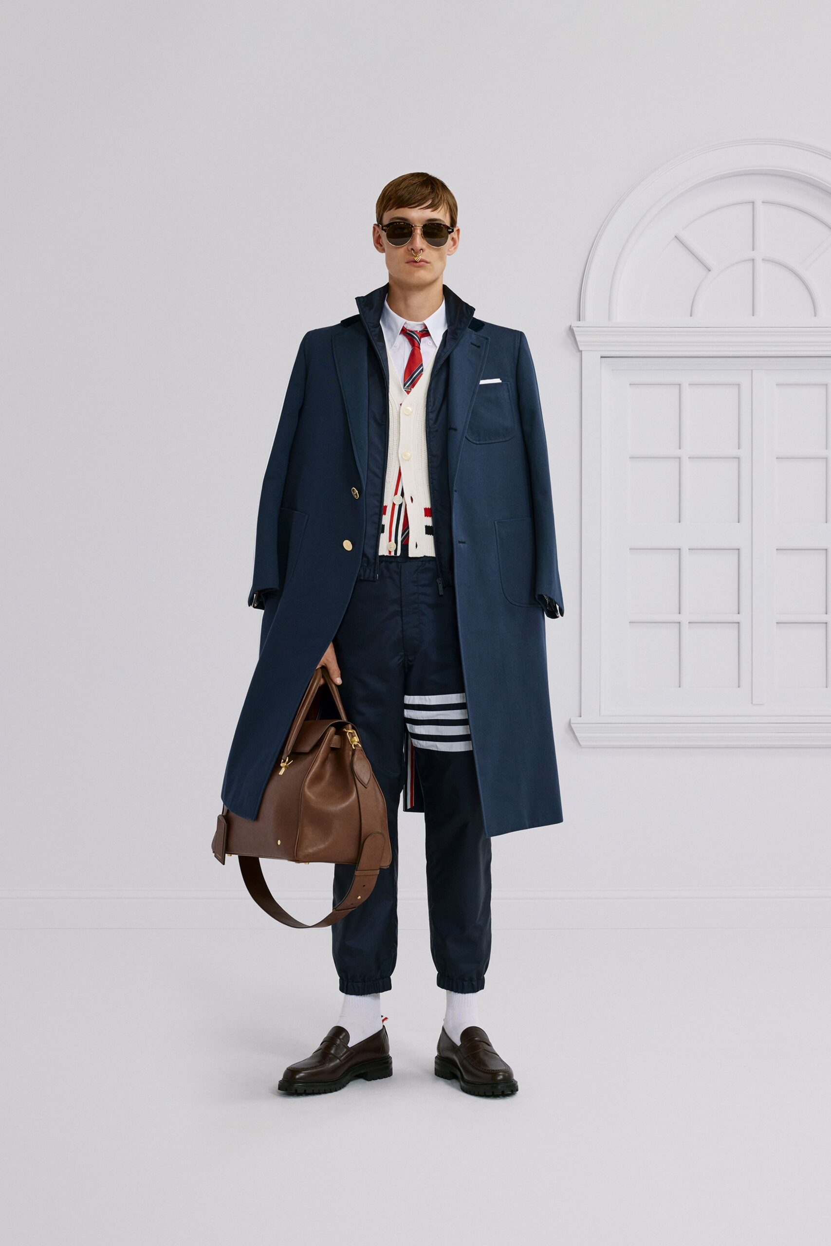 blue coat with white vest
