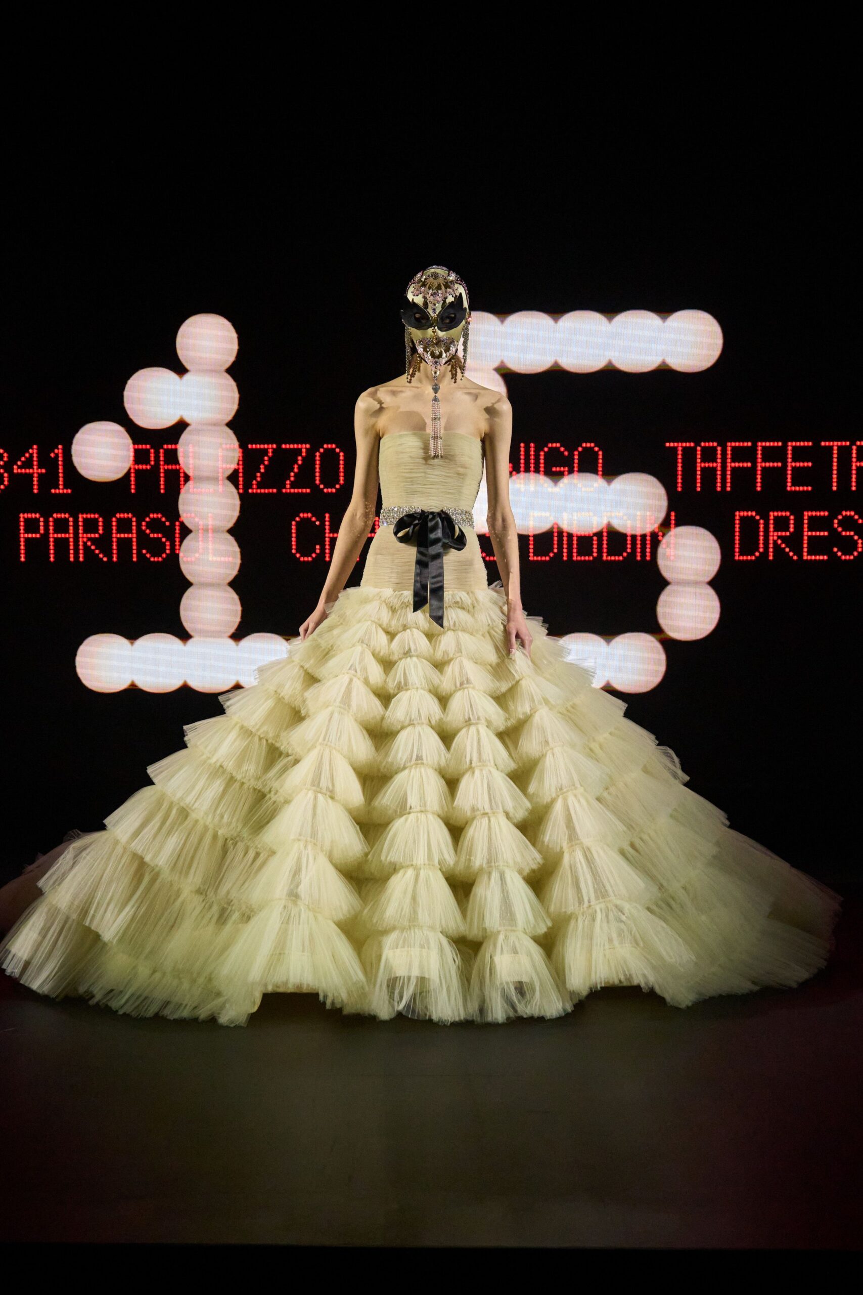 yellow tulle sleeveless off-shoulder fitted tiered flowing gown