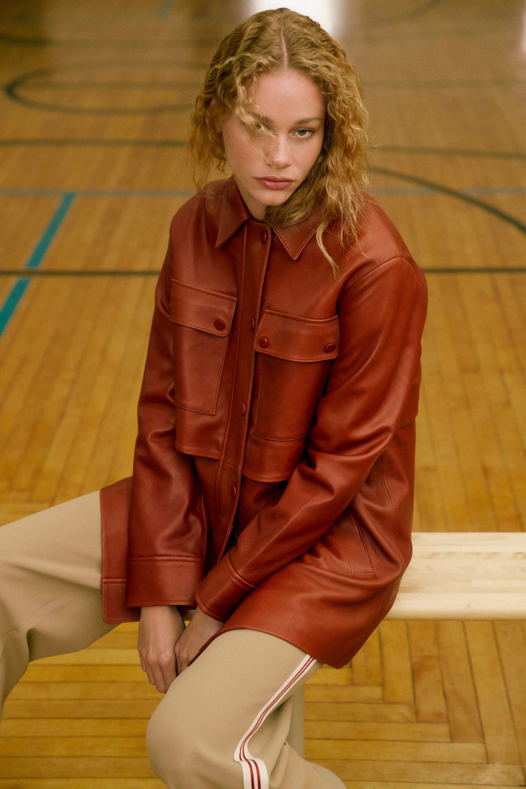 brown leather long-sleeve collared relaxed buttoned jacket