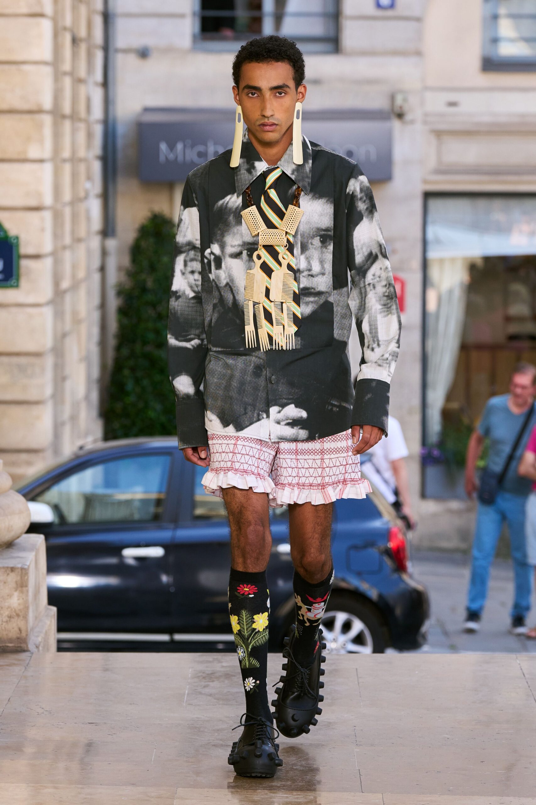 black and white printed shirt with mini skirt