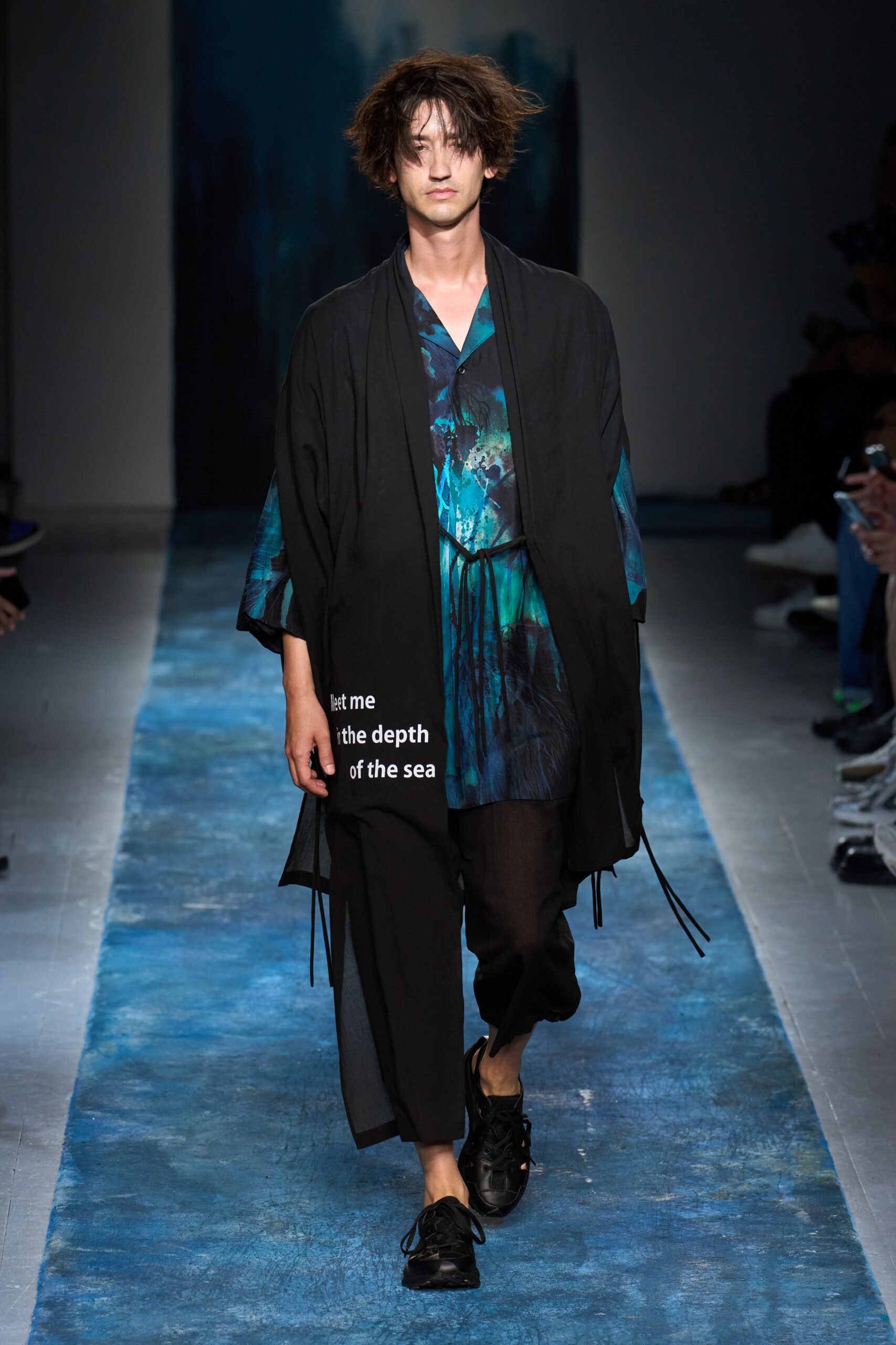 black oversized coat with printed shirt