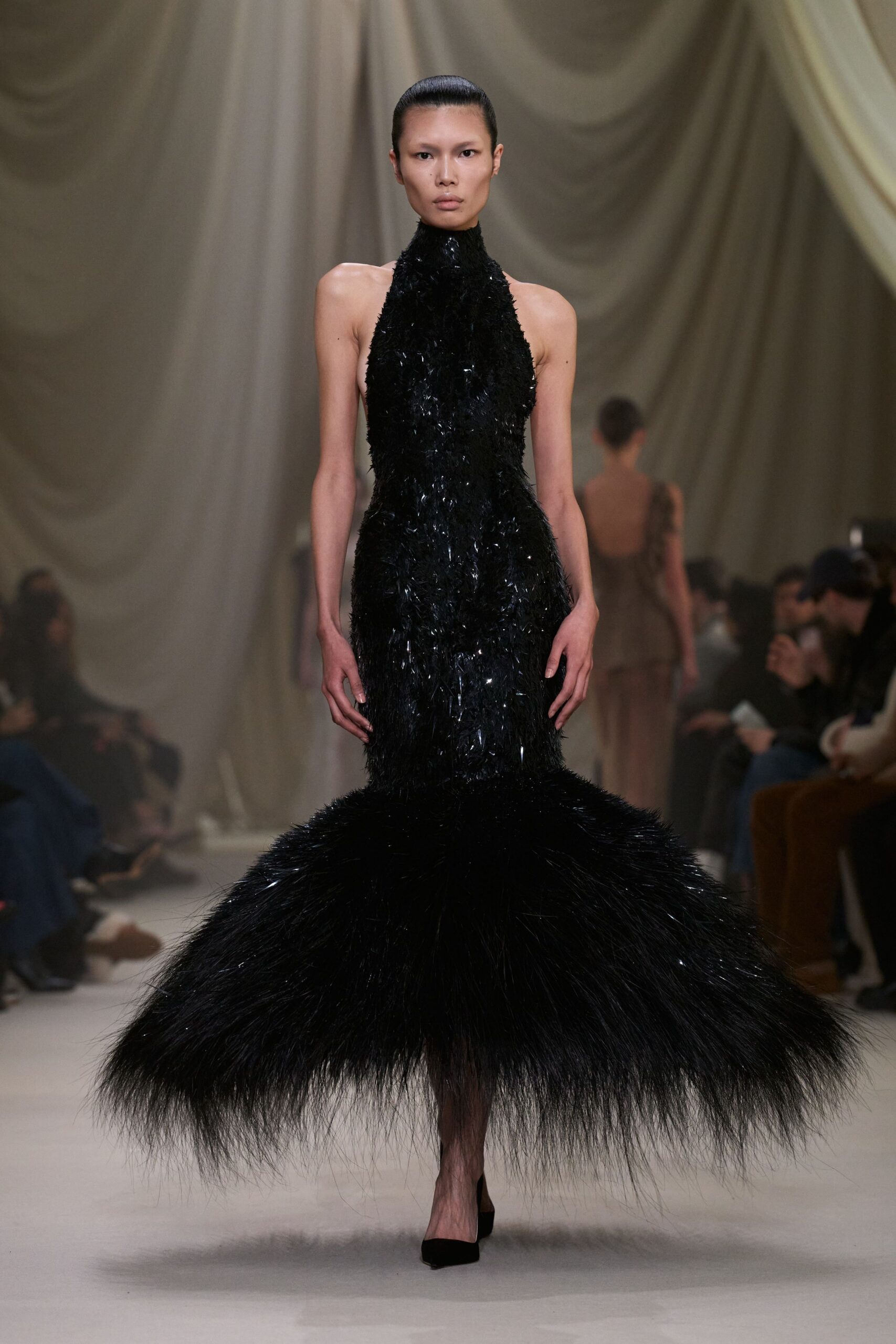 black silk sleeveless high-neck fitted sequined flared gown