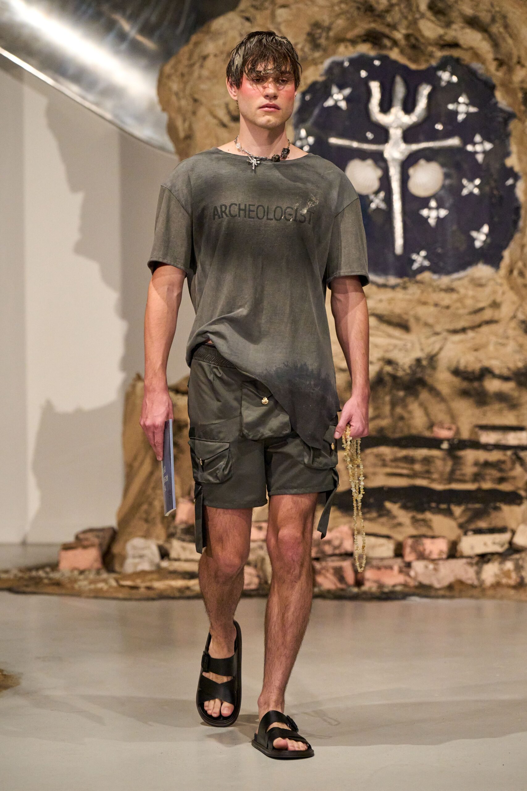 gray t-shirt green cargo shorts