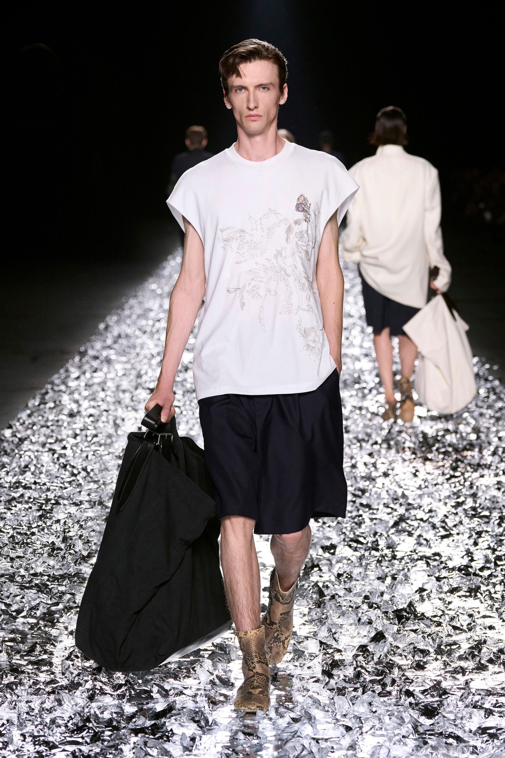 white relaxed t-shirt with black shorts