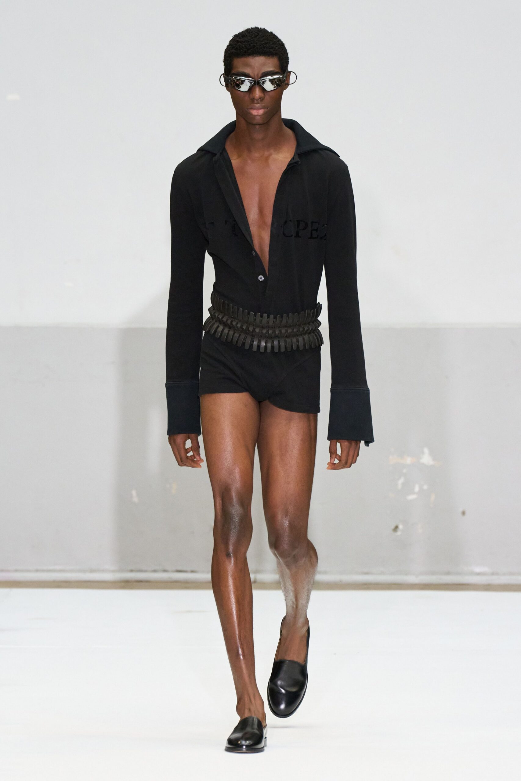 black fitted shirt and shorts