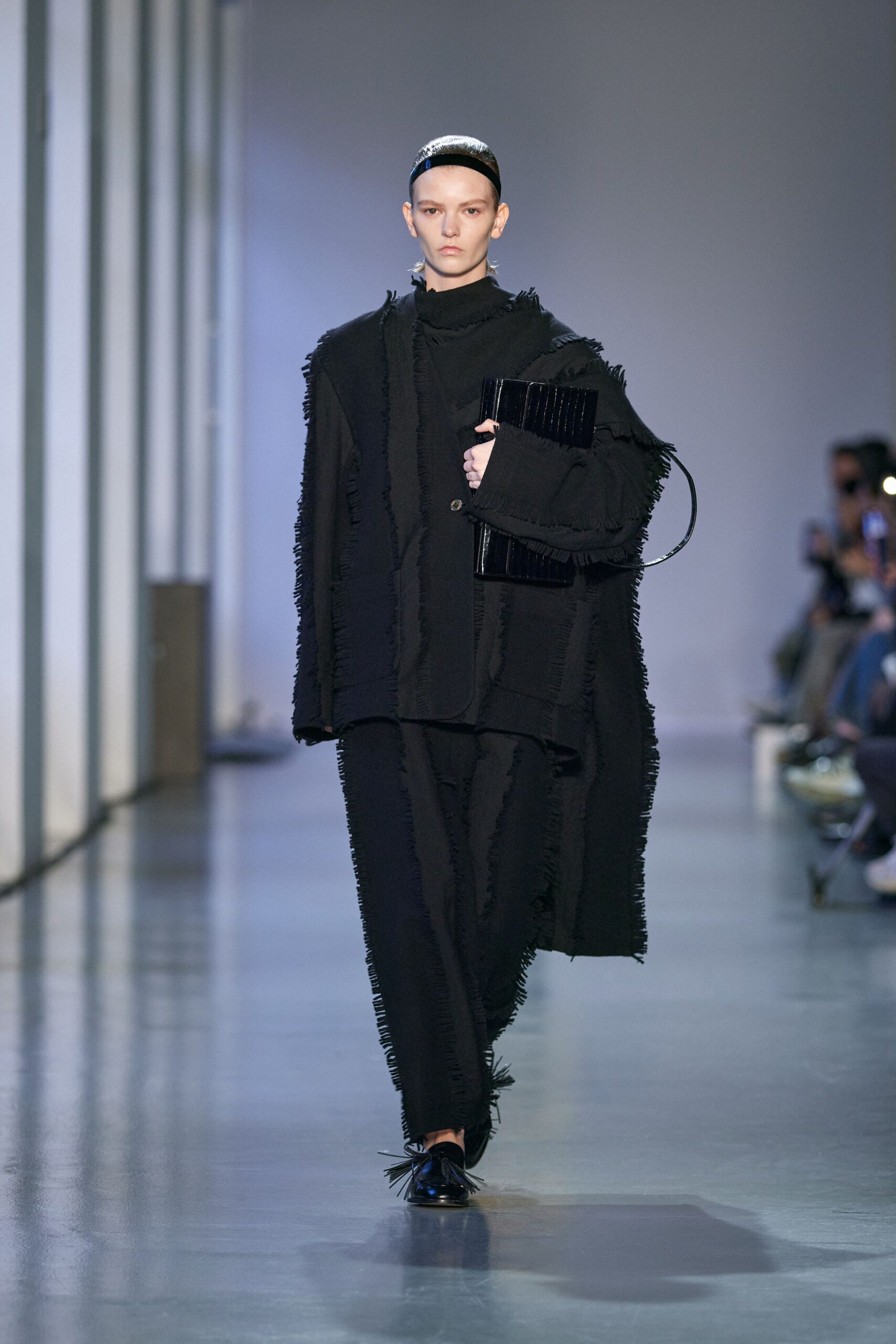 oversized black coat with relaxed pants