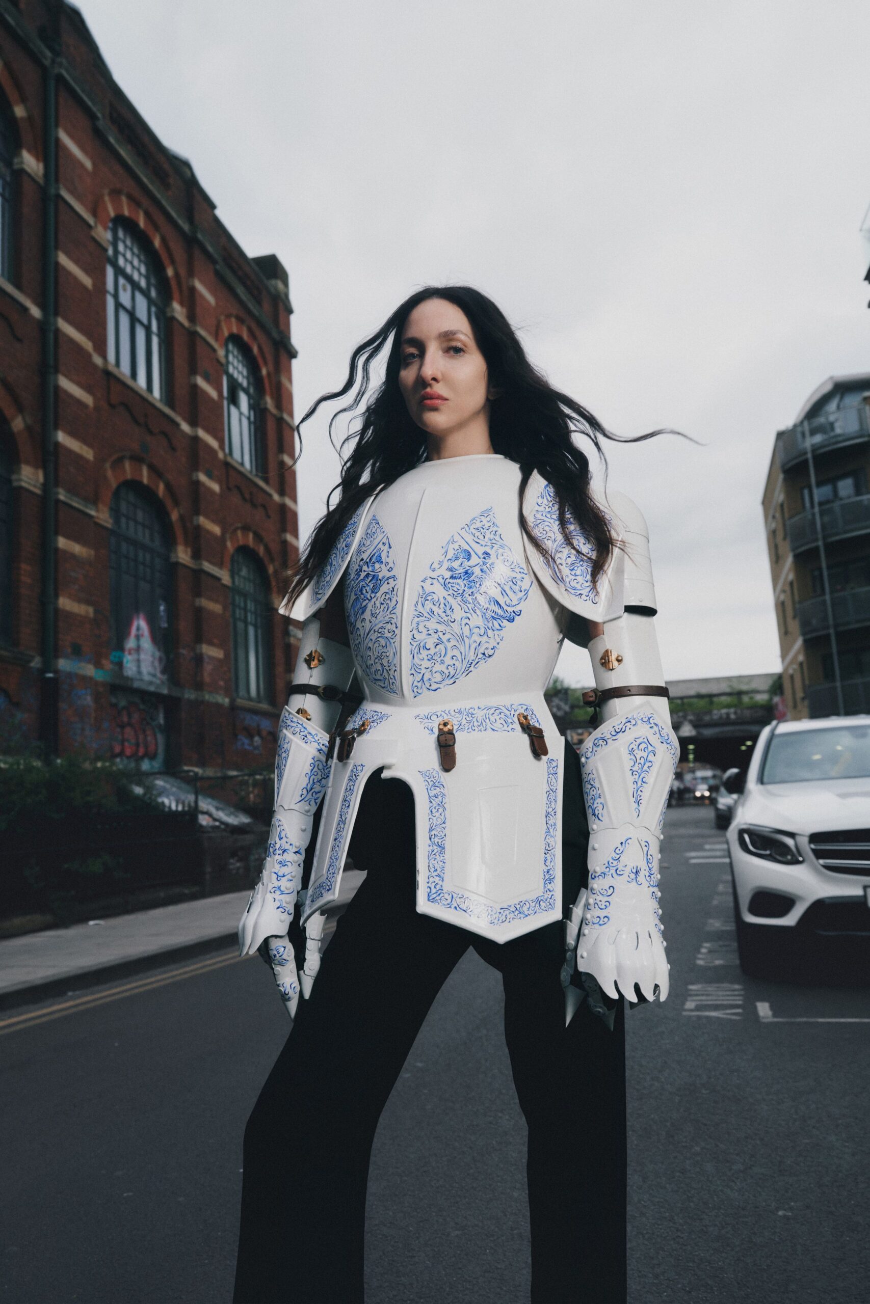 black fitted pants and white armor