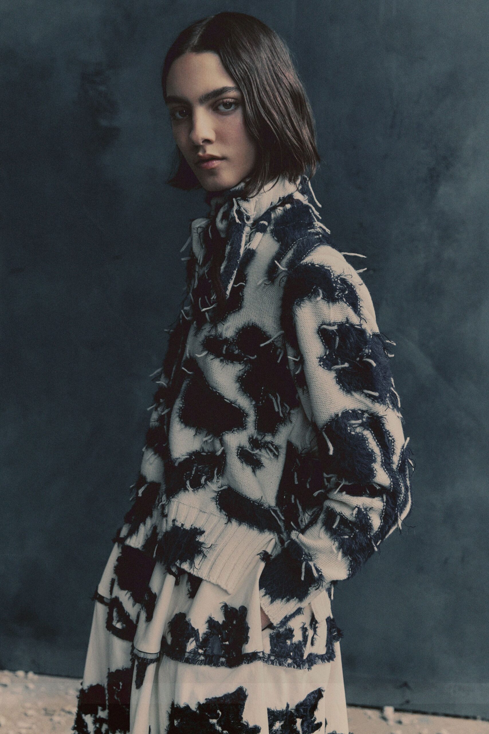 black cotton long-sleeve collared fitted fringed printed blazer