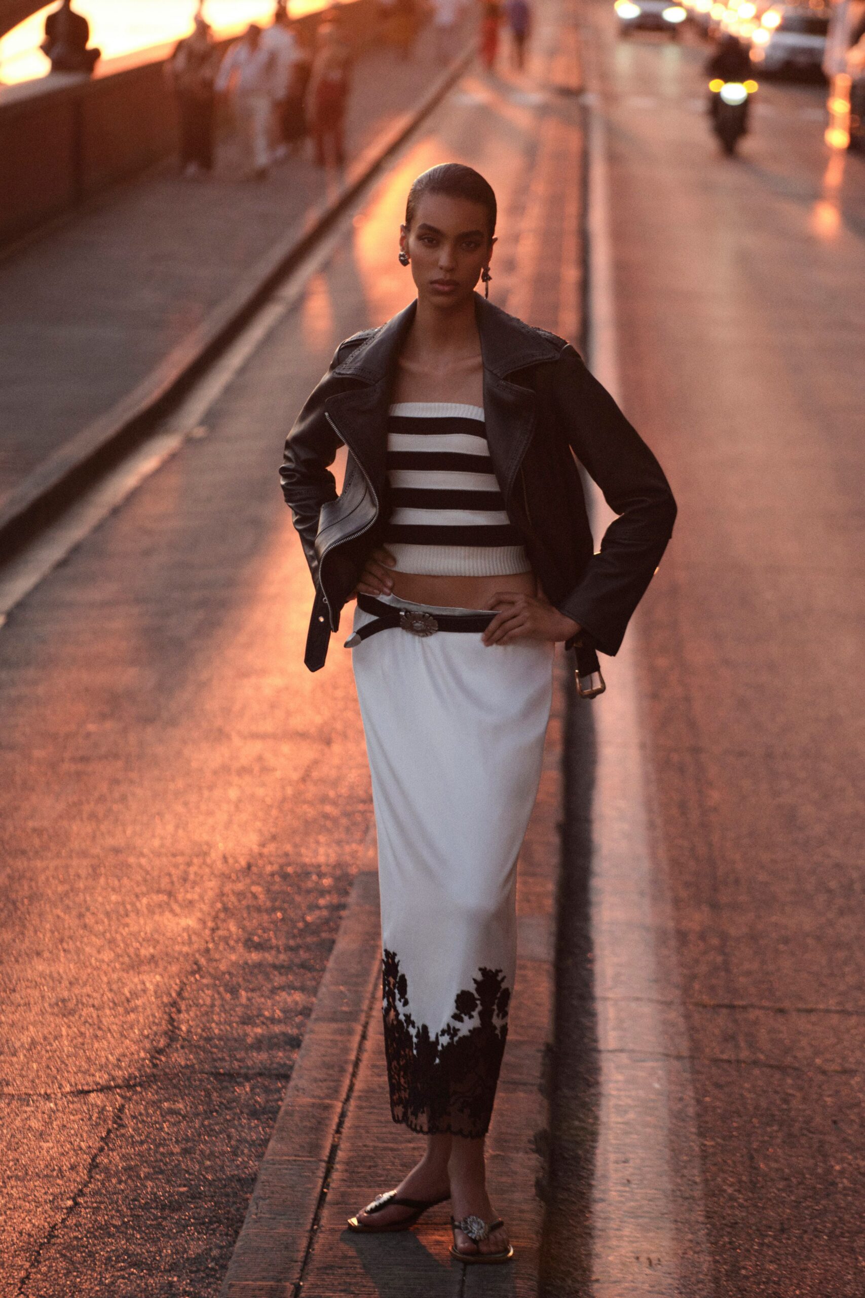 black leather jacket with striped top