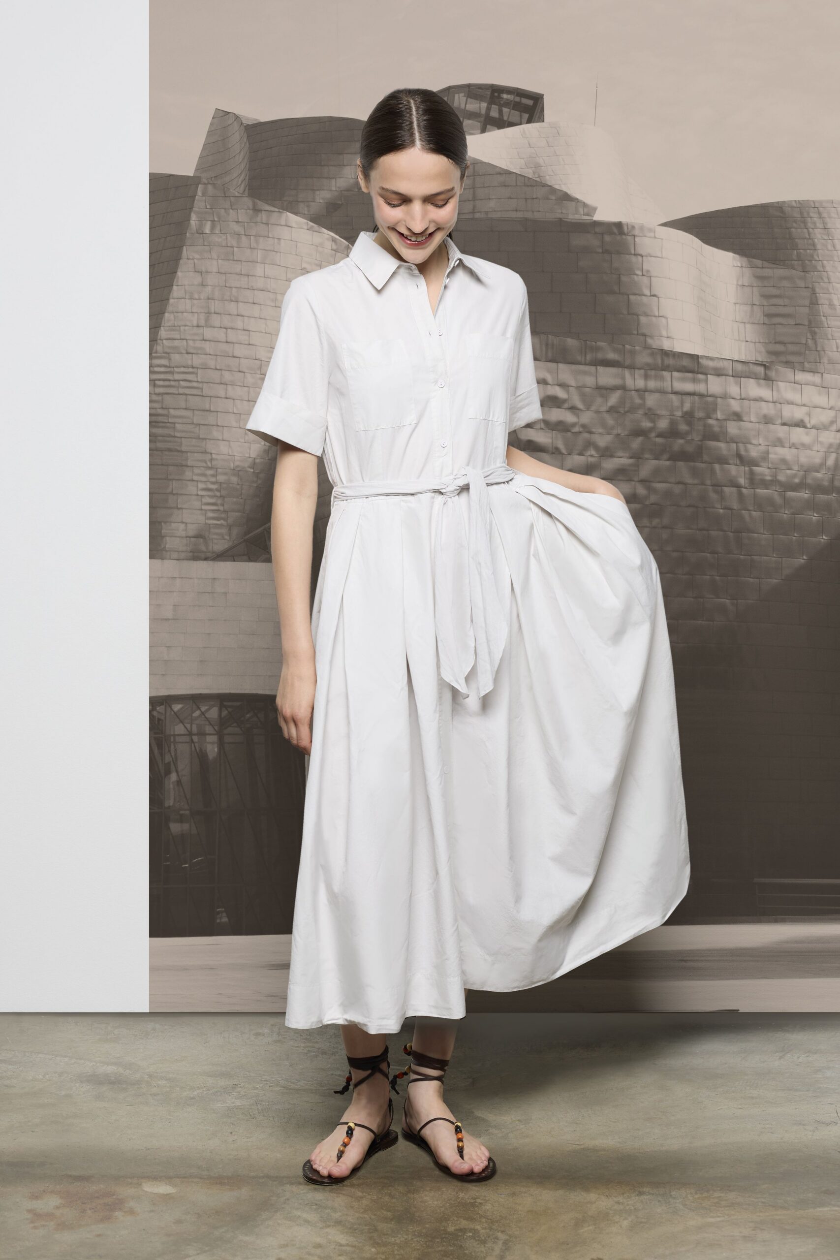 white shirt-dress with black sandals