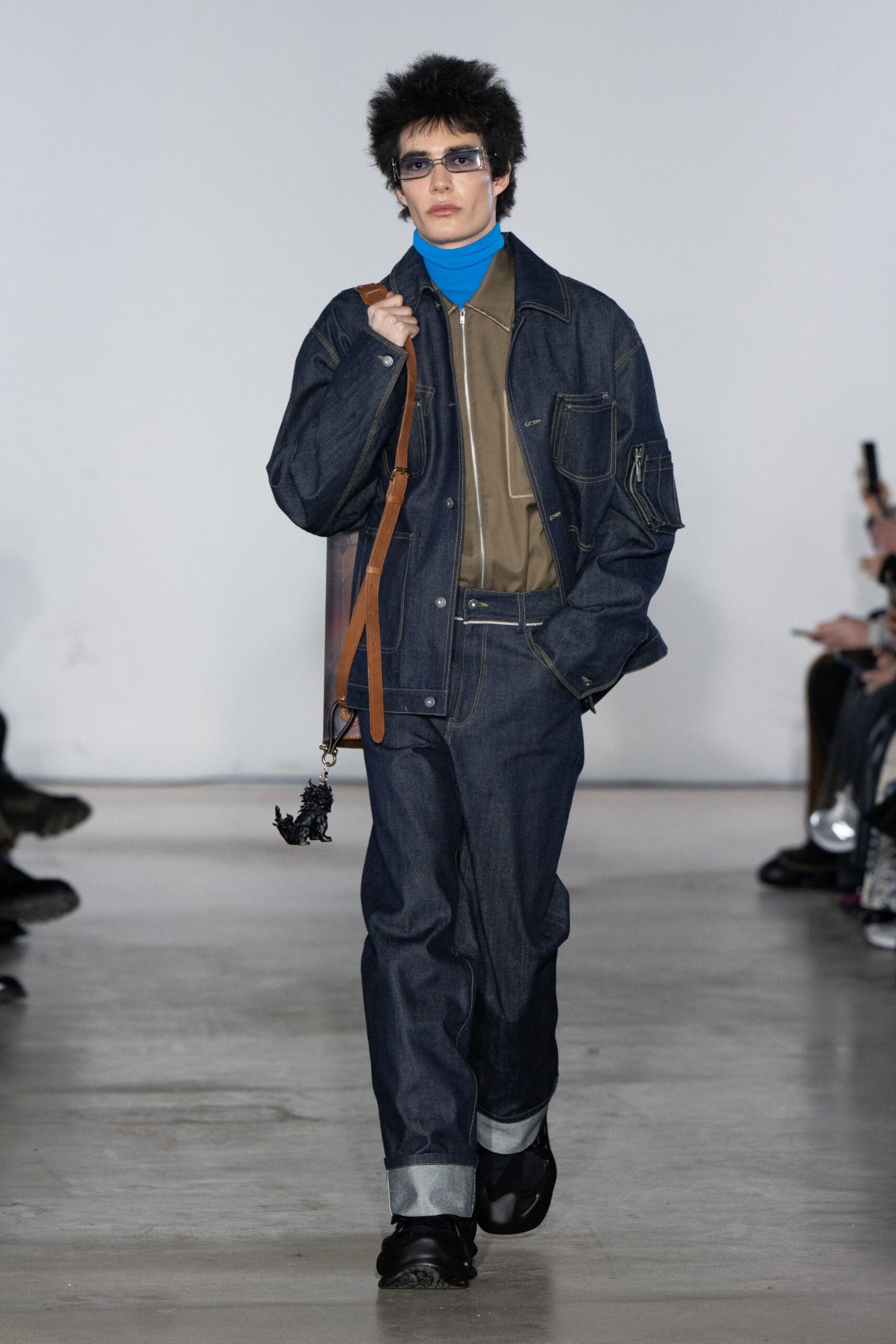 blue denim jacket with brown shirt
