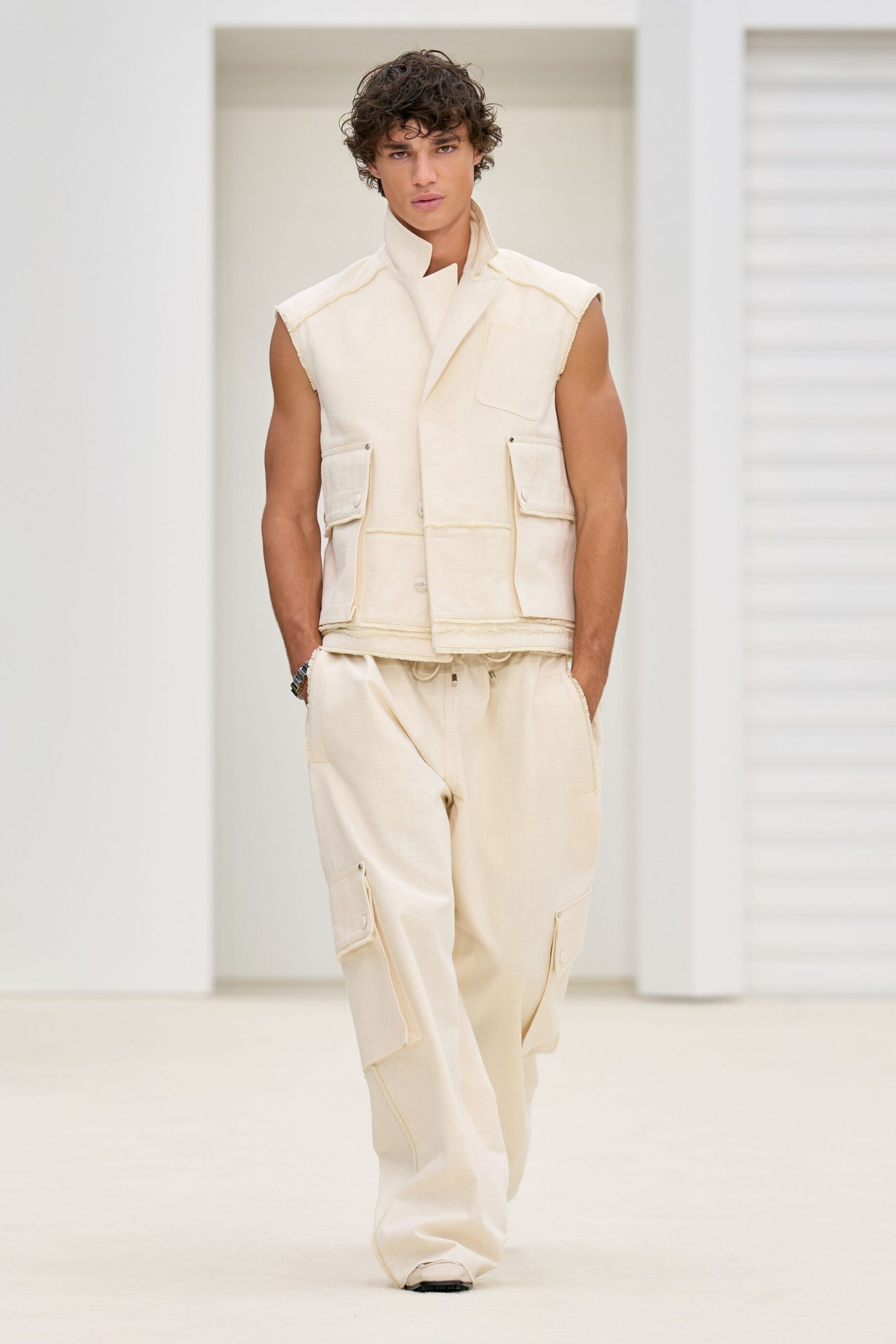 beige cotton sleeveless collared relaxed buttoned pockets vest