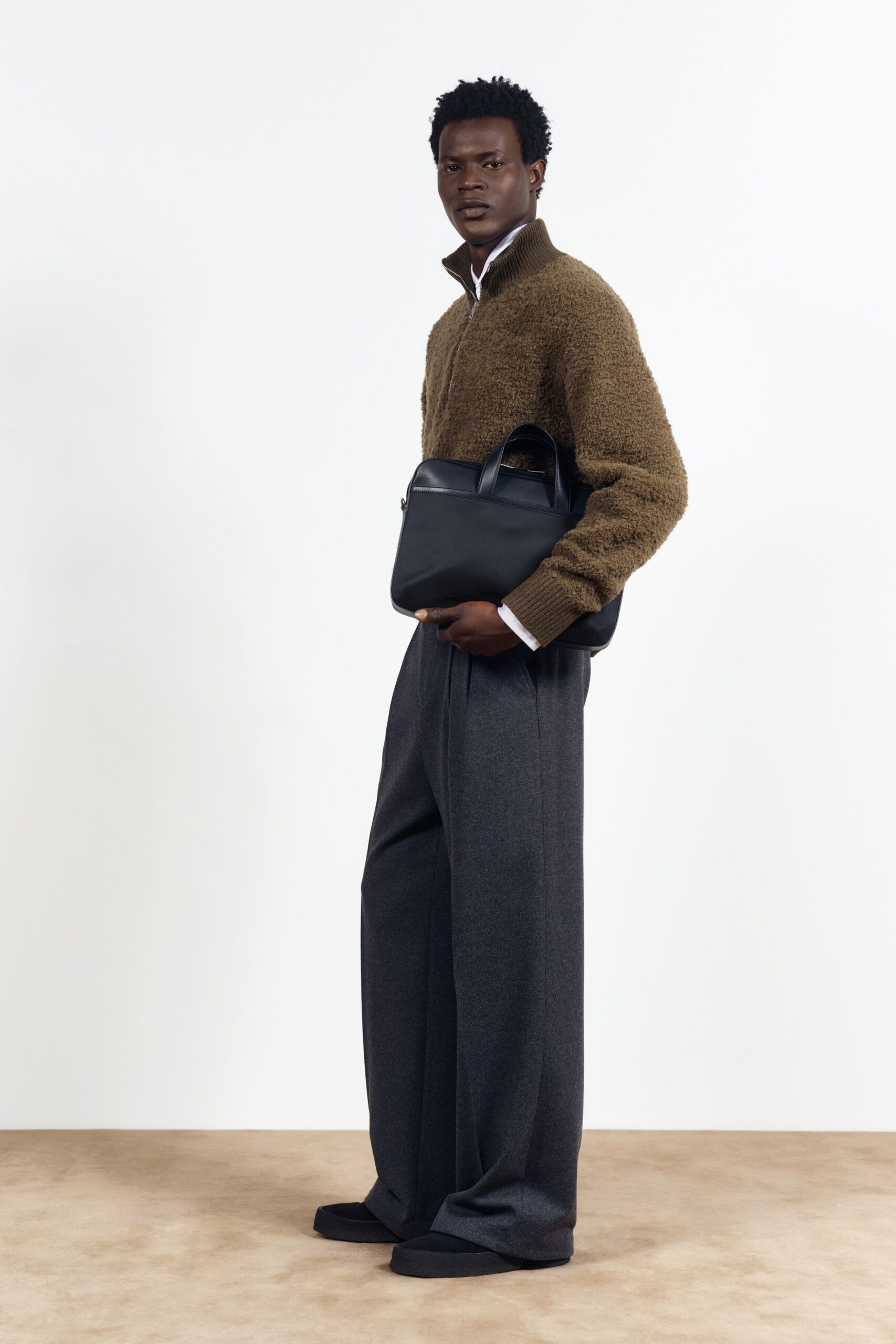 brown wool relaxed sweater with gray pants