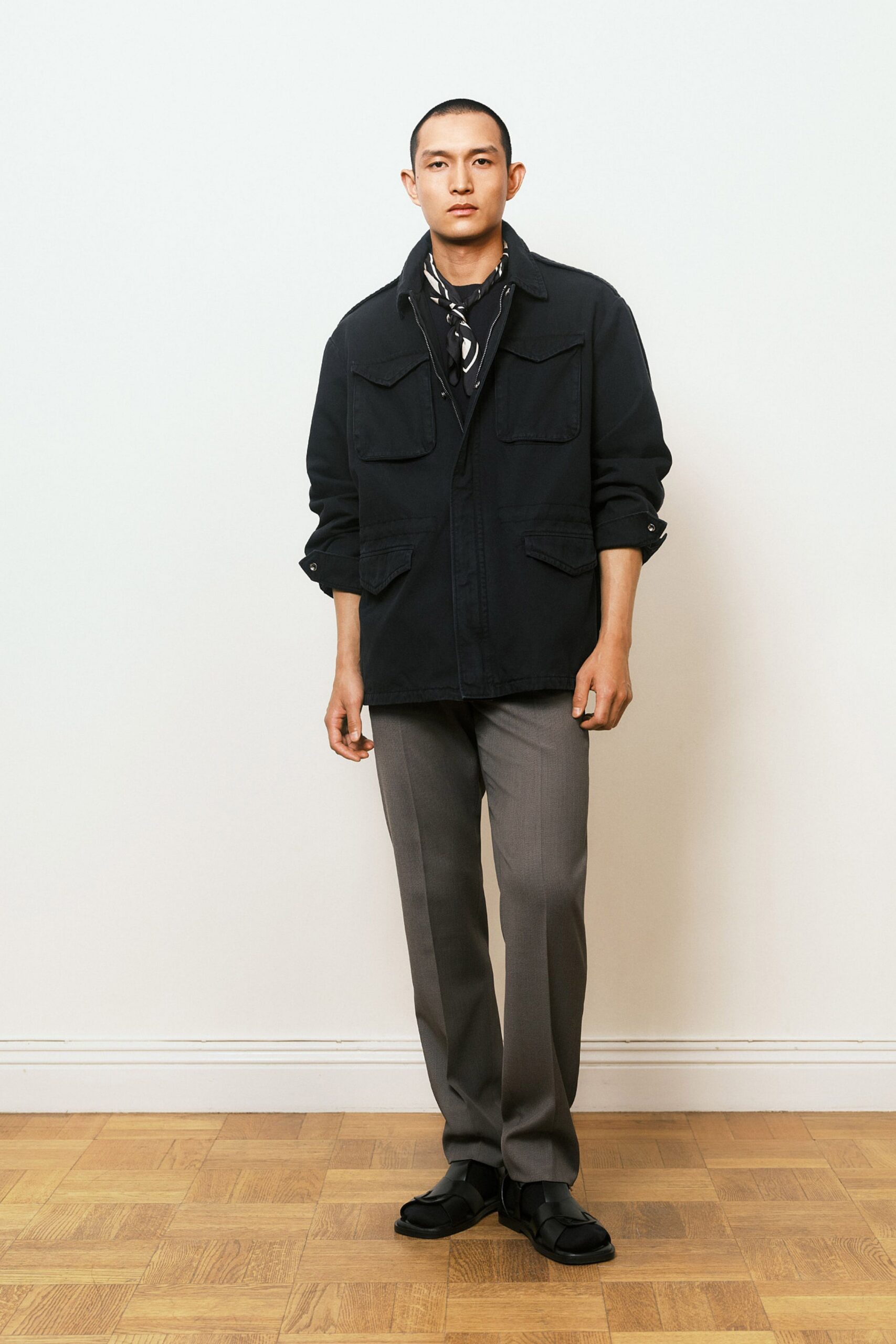 black relaxed jacket gray tailored pants