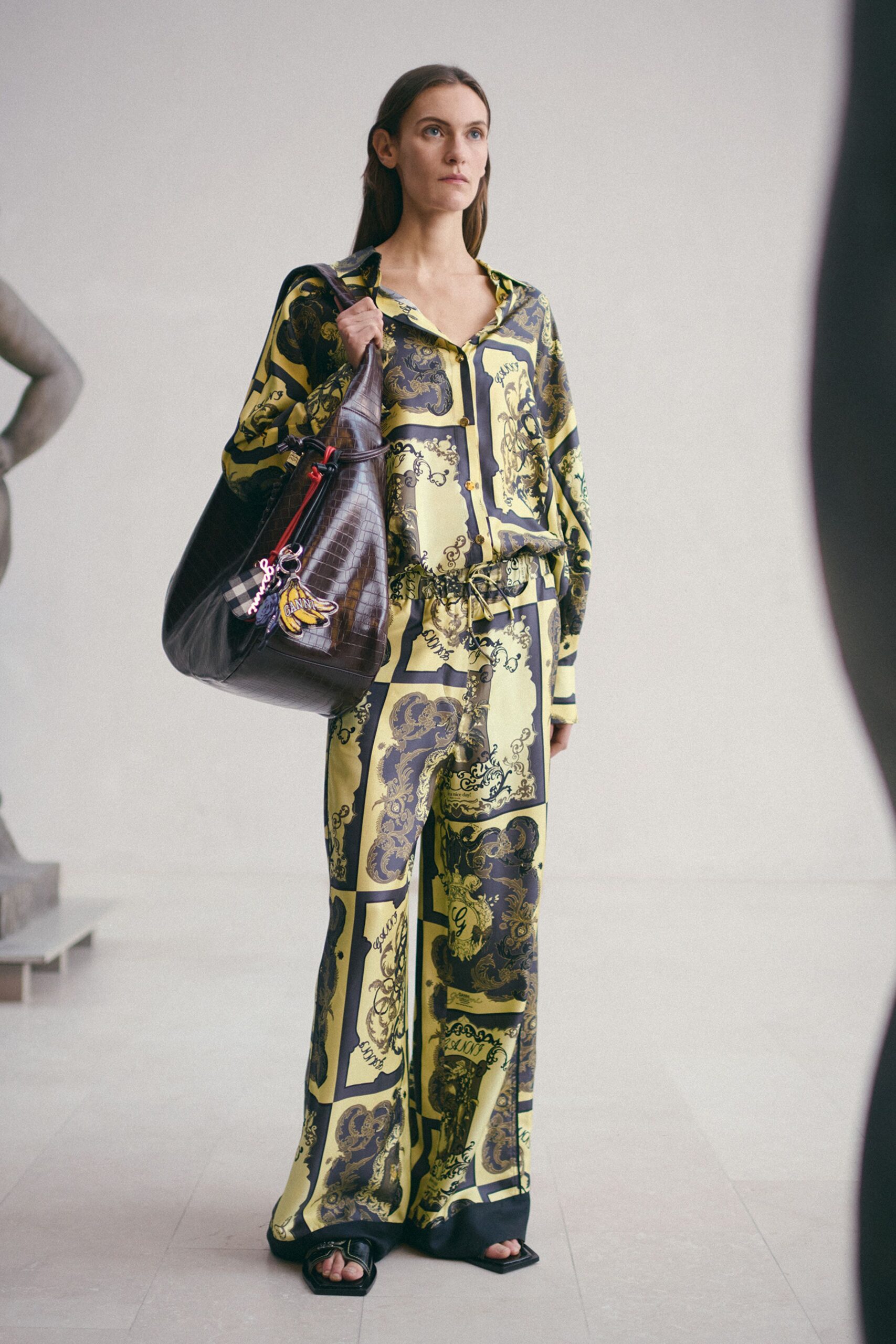 yellow silk long-sleeve collared relaxed printed jumpsuit