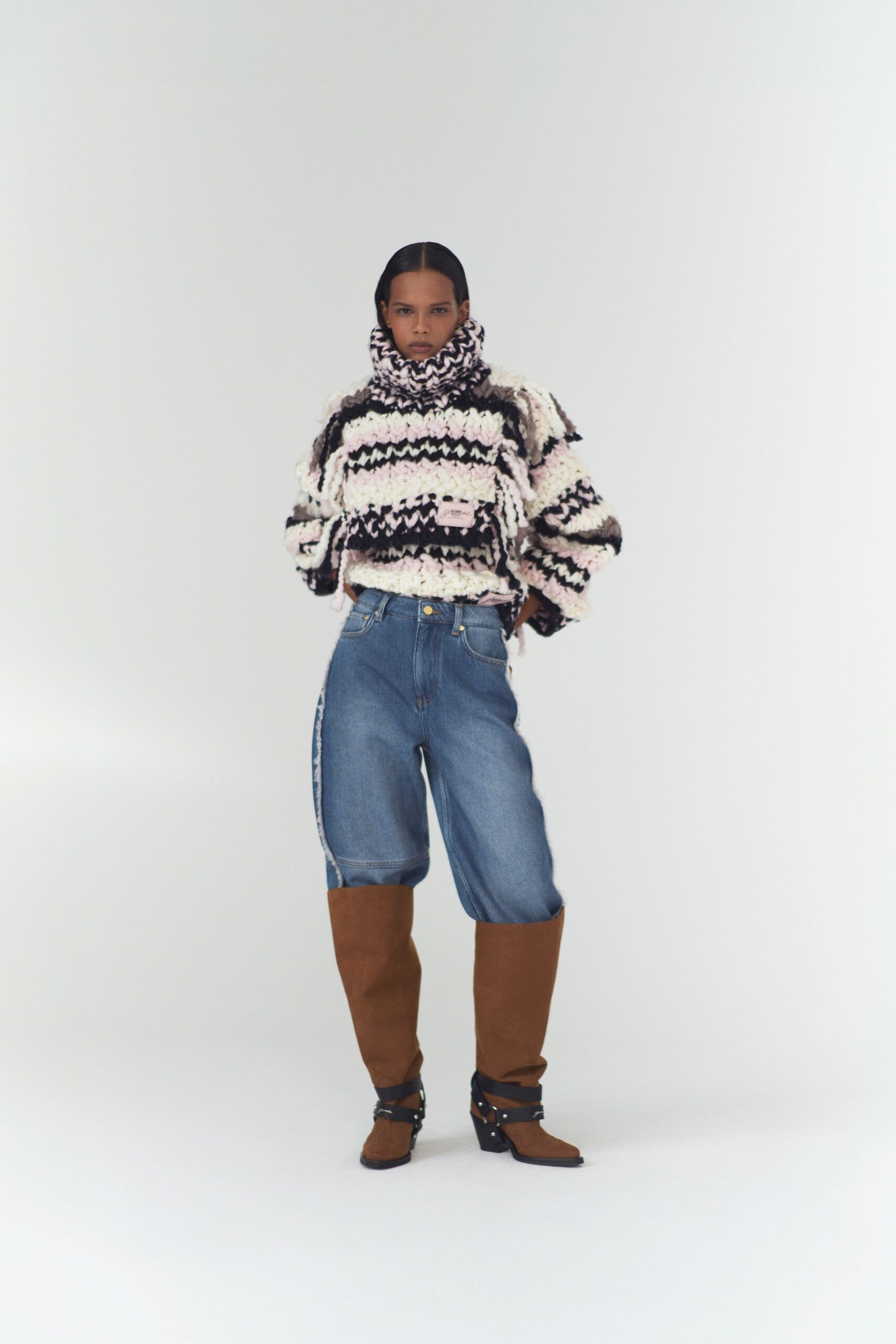relaxed striped wool sweater with denim pants