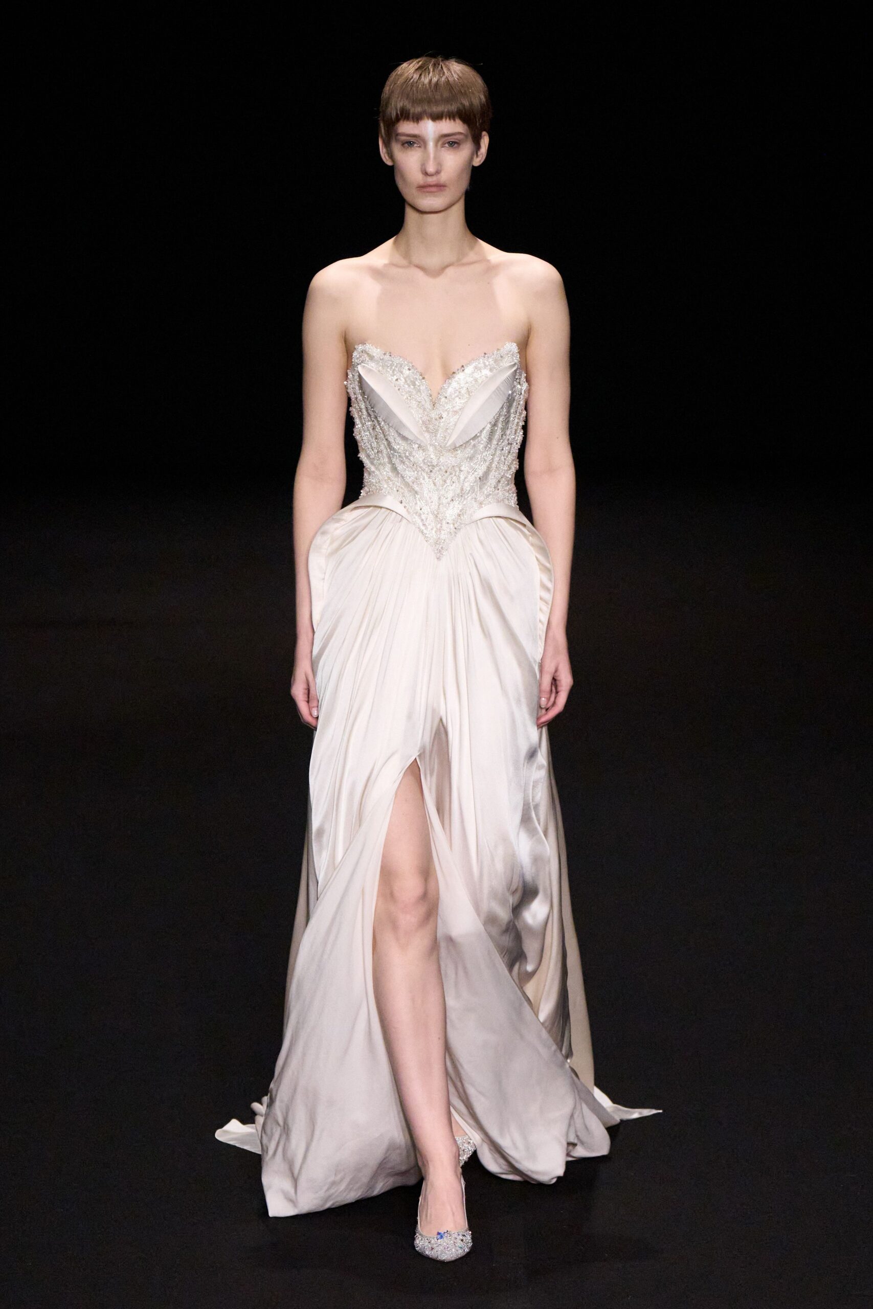 white silk strapless slit fitted beaded draped gown