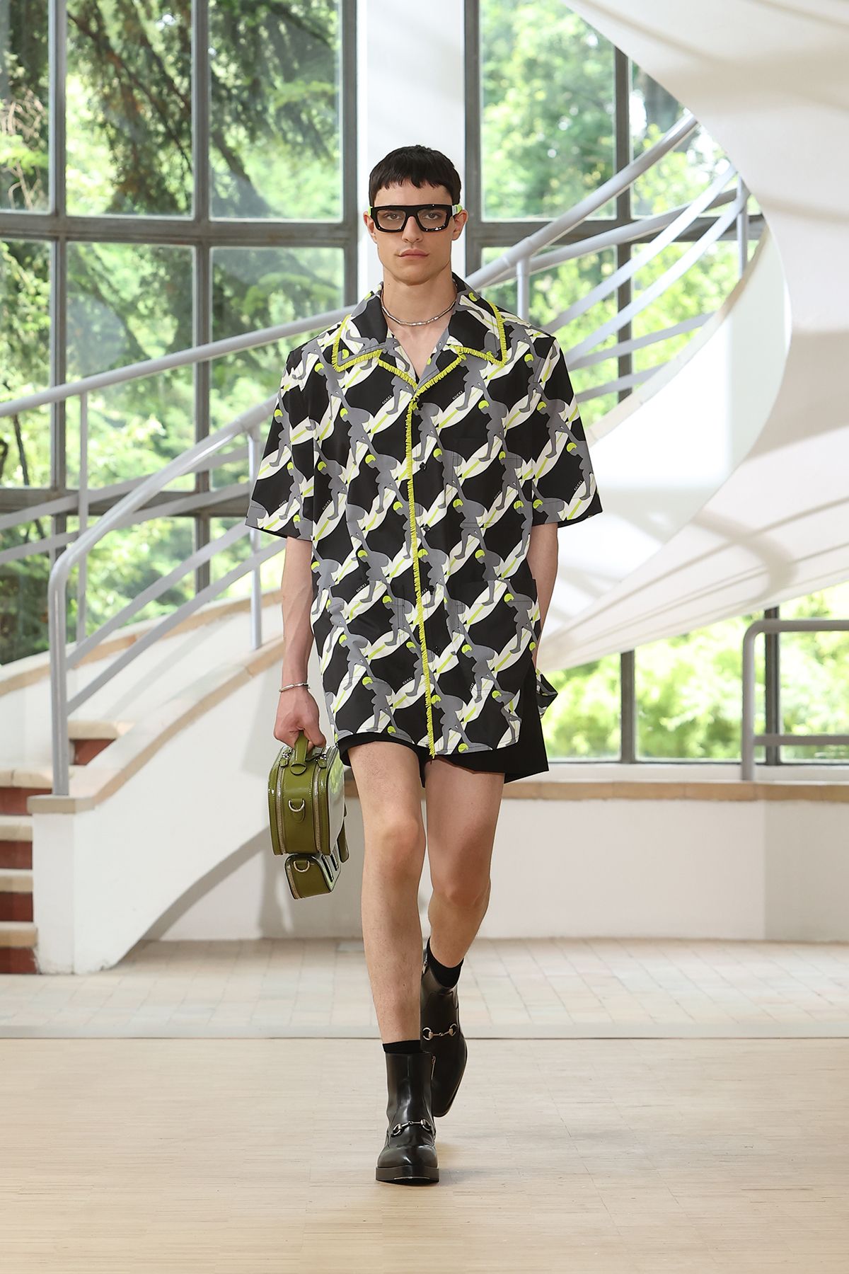 black and green printed shirt with shorts