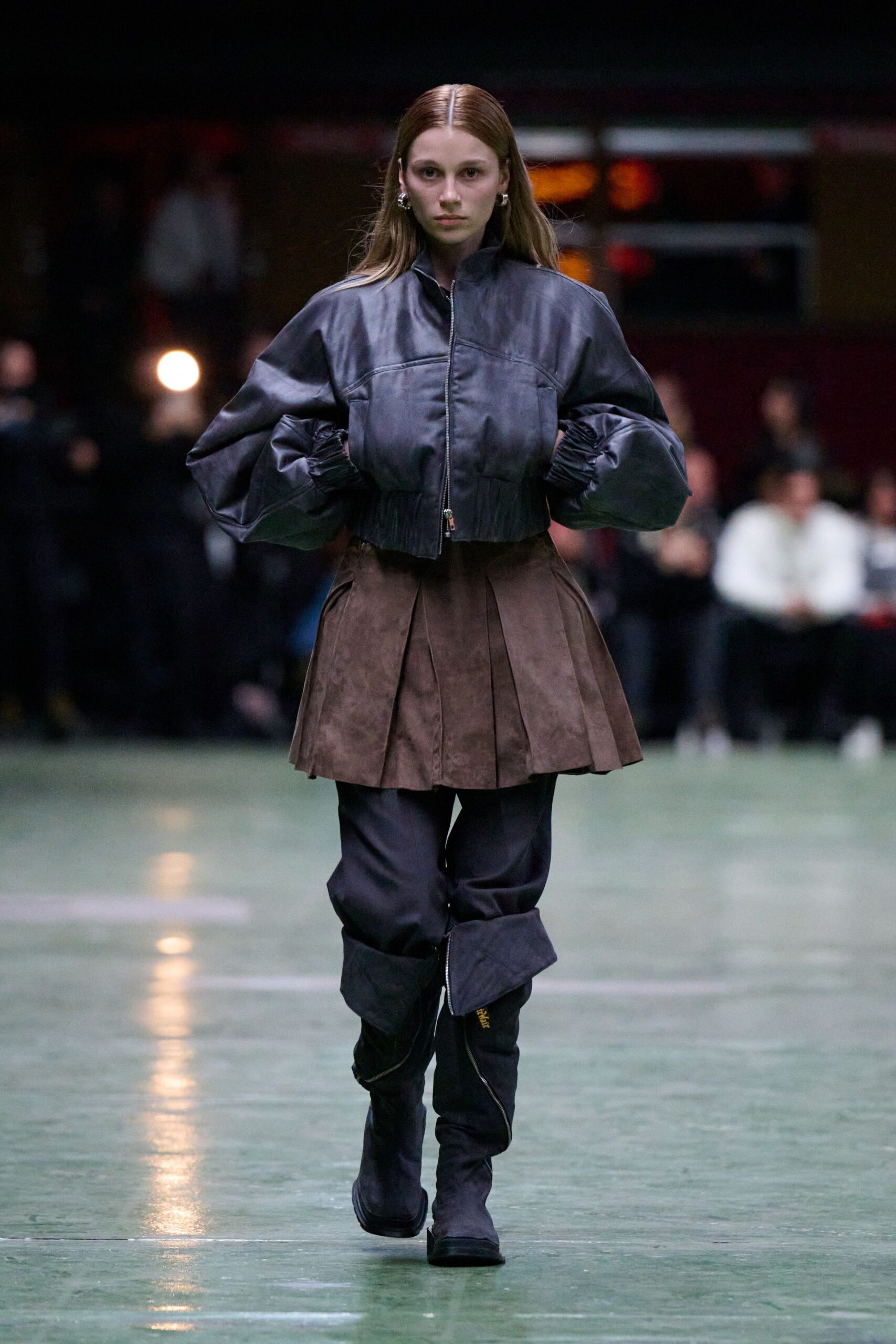 black leather jacket with brown skirt