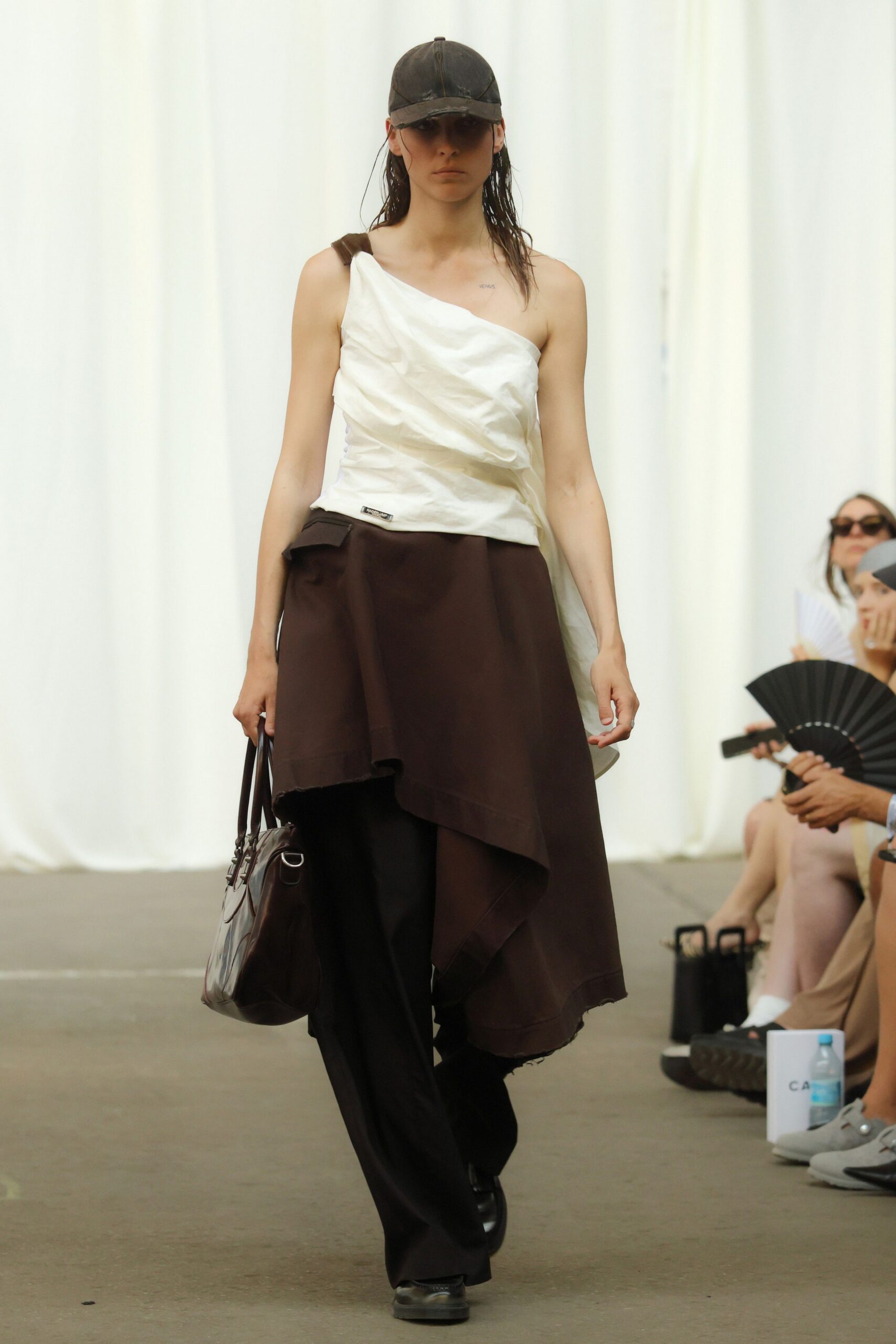 white silk asymmetric top with brown skirt